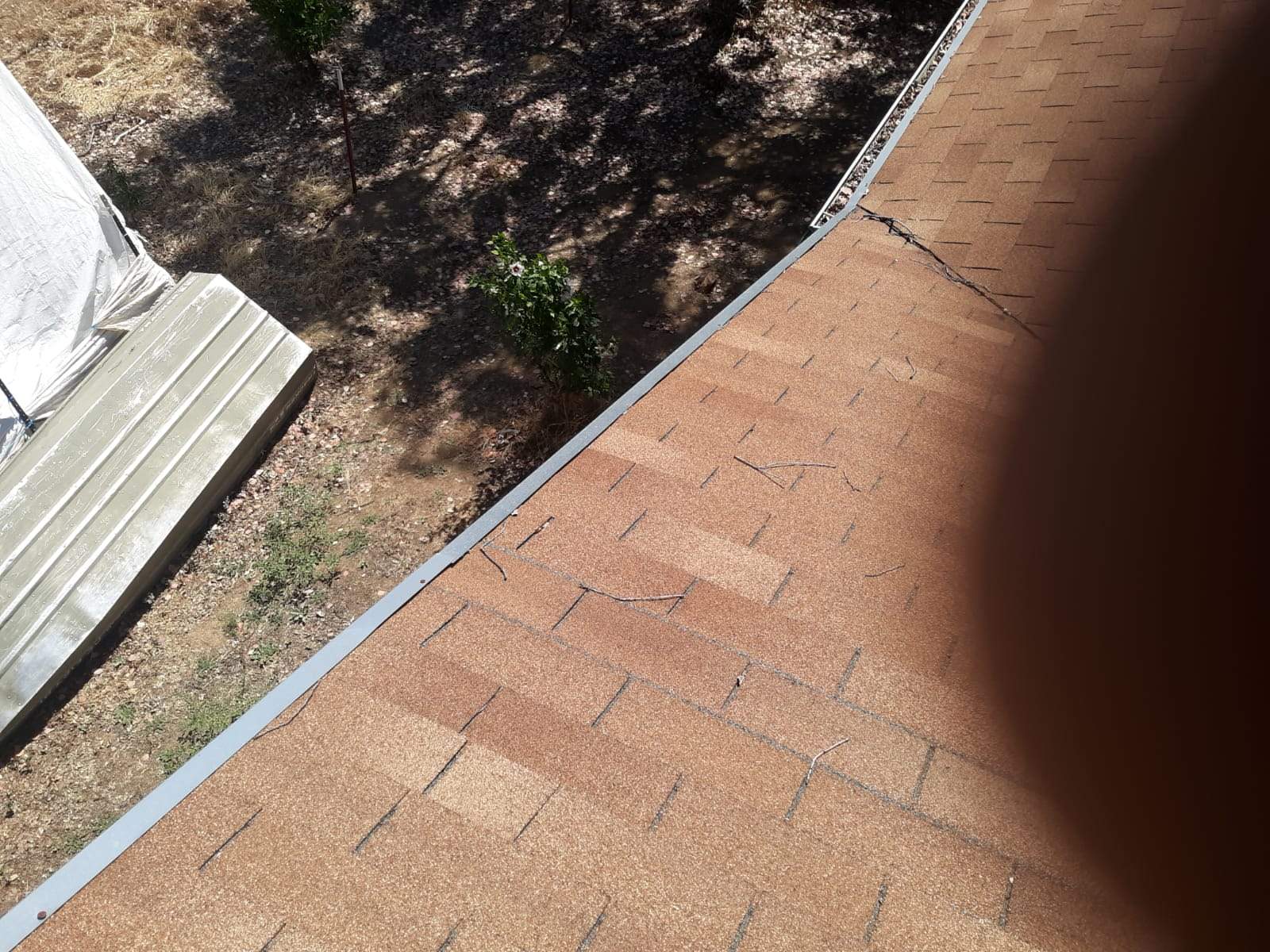 Metal roofing installation using Standing seam metal roofing system by Straight Edge Roofing Inc