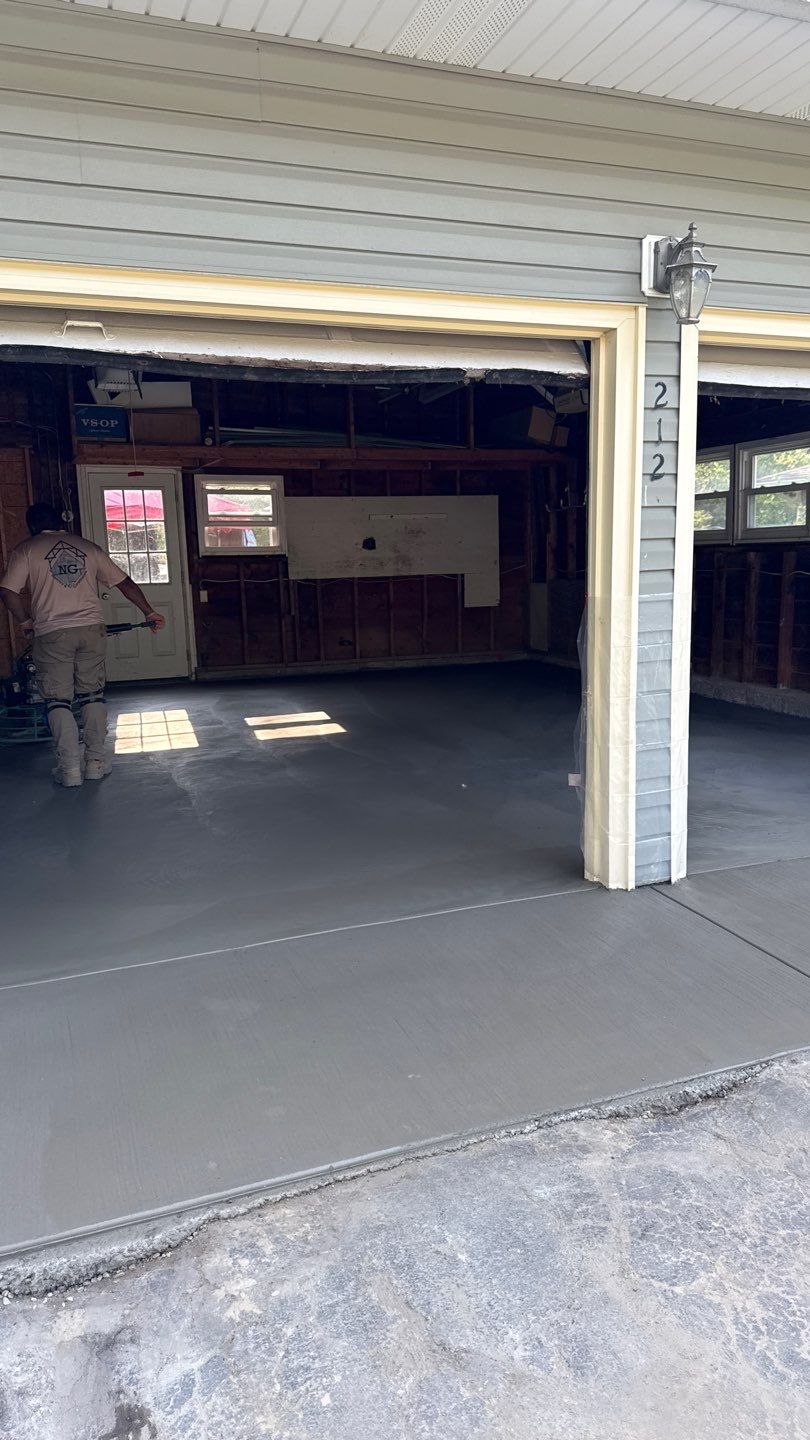 Concrete garage floor replacement  by NG Masonry & Construction LLC