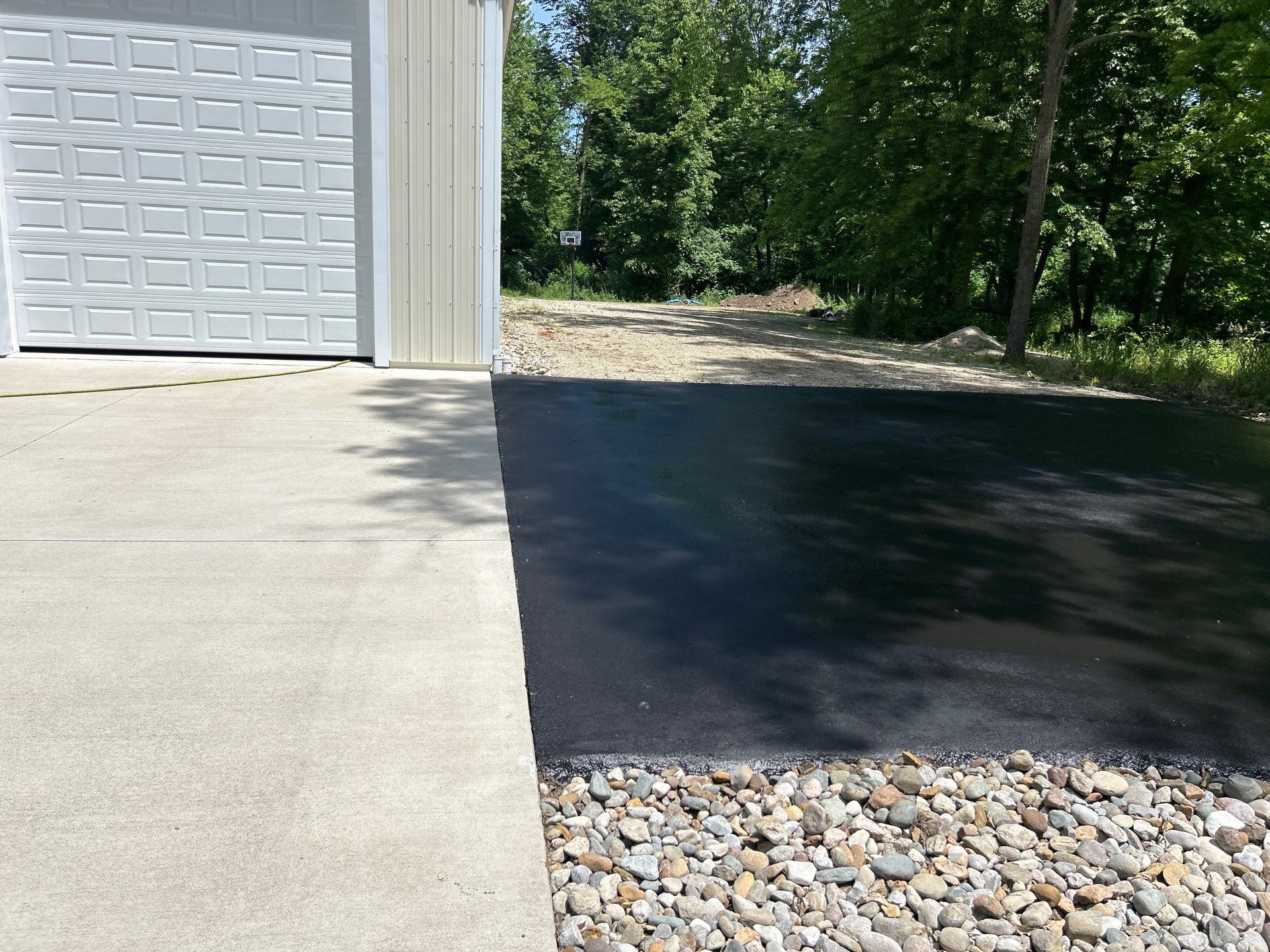 High end residential driveway by Quality Asphalt & Maintenance LLC