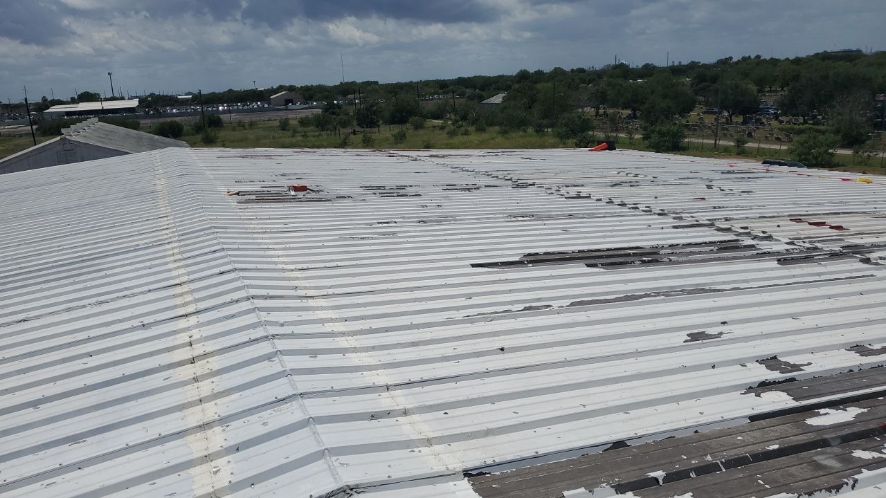 Commercial Roofing Installation using GAF 10 Year Acrylic System by Lighthouse Roofing