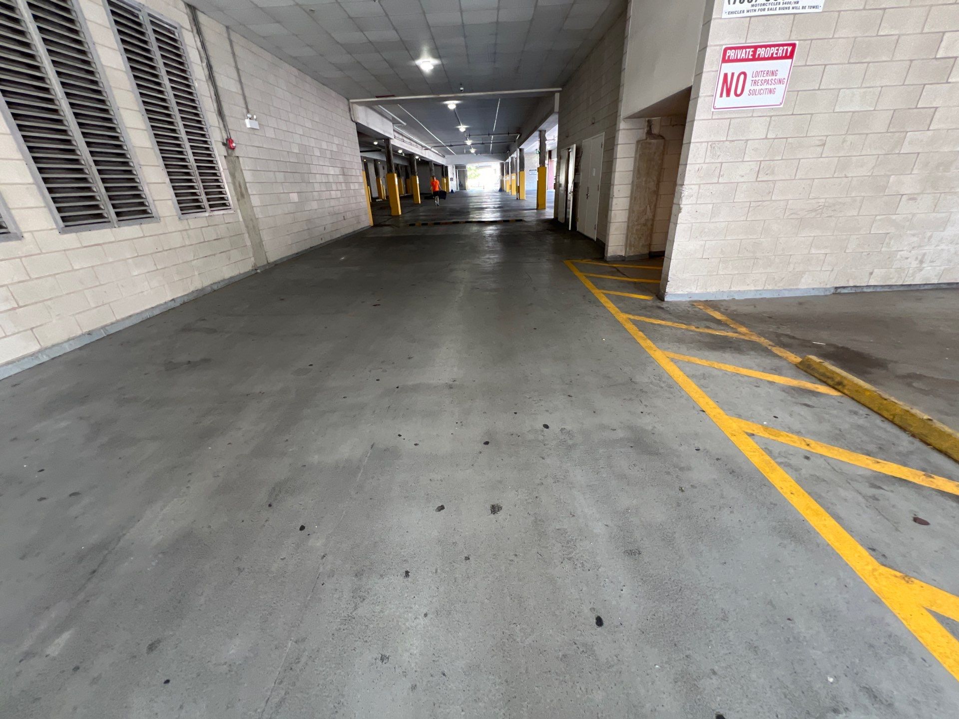 Parking garage using Hot water by Northern Power Washing LLC.