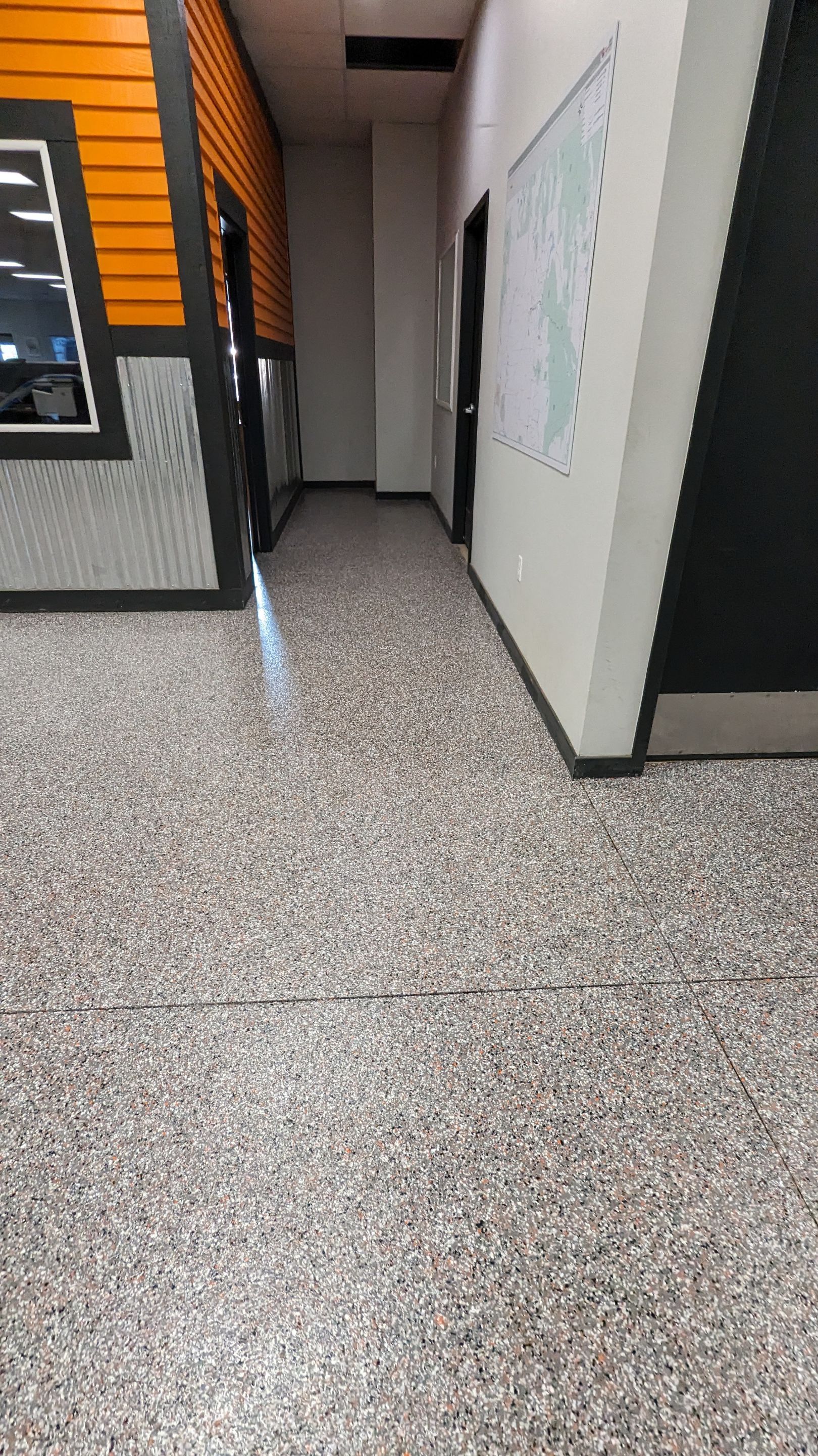Equipment Share Commercial Floor Transformation using Smoke w/ 5% Orange by Croc Coatings, LLC