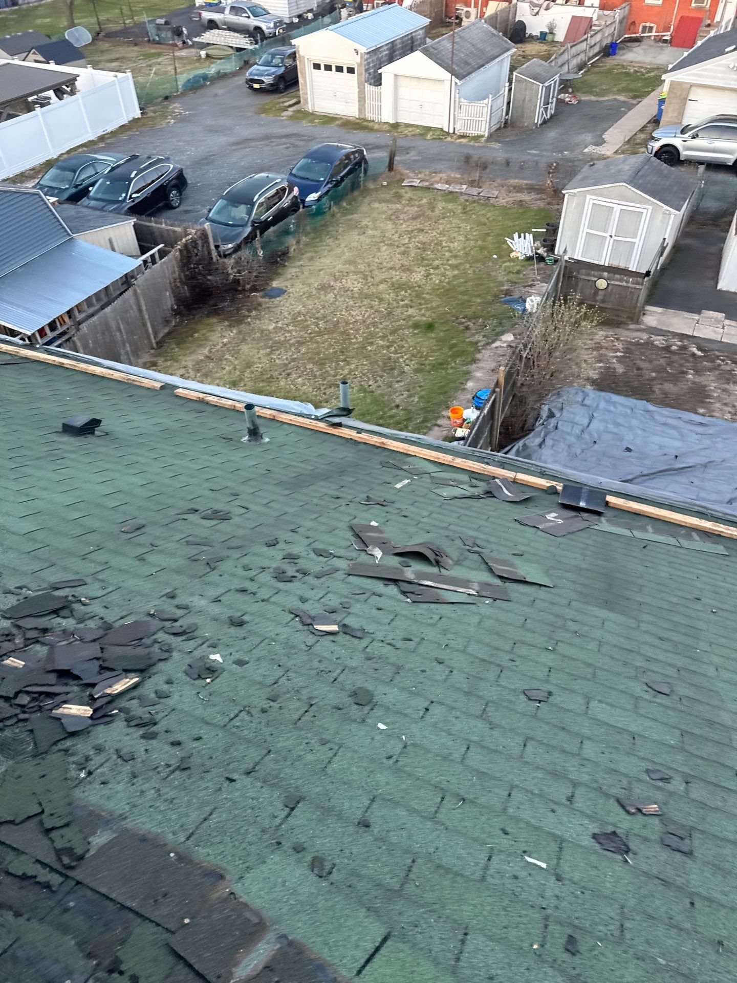 Onyx Black Shingles by Reimagine Roofing