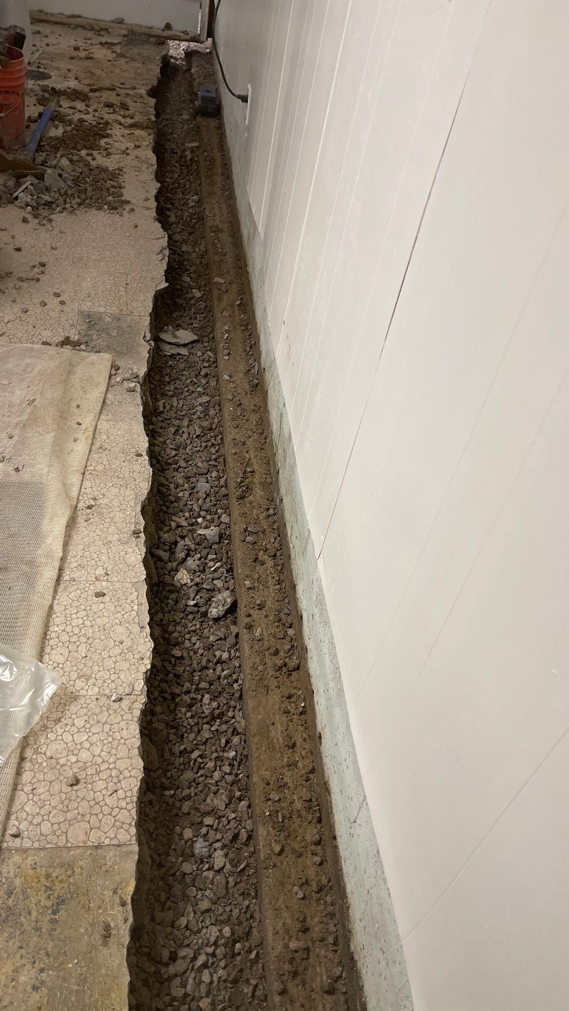 Interior Waterproofing Using GrateDrain™ Products by Toledo Basement Repair