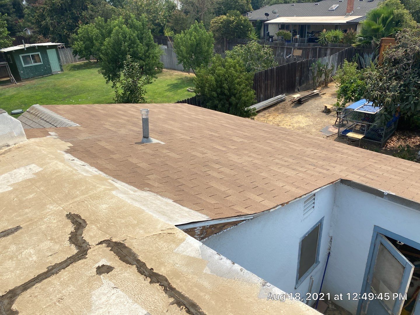 Residential Roofing Installation using Spray foam roofing insulation and General Coatings acrylic coatings by Straight Edge Roofing Inc