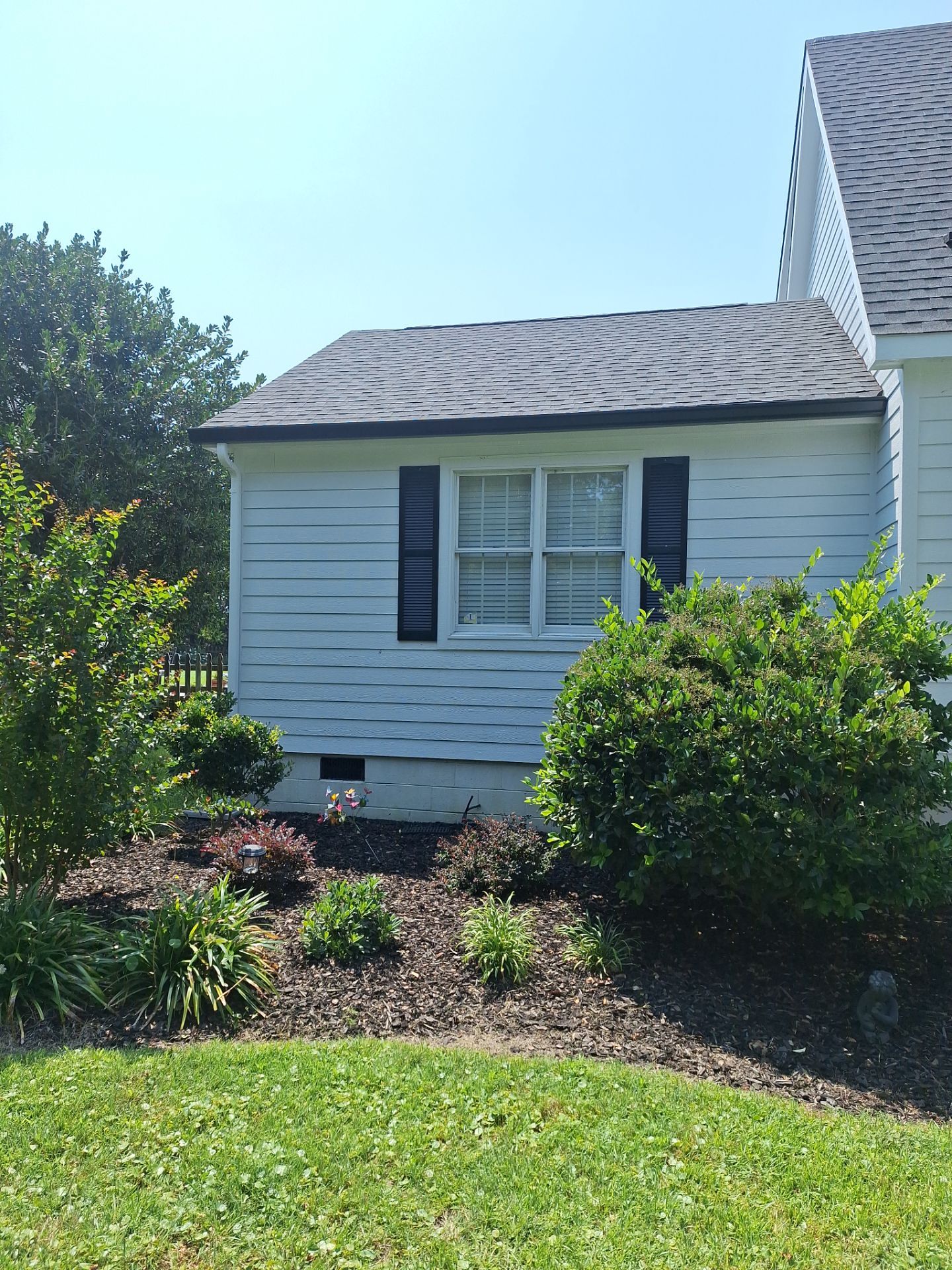 Black Gutter Installation by Gallop Roofing & Remodeling, Inc.