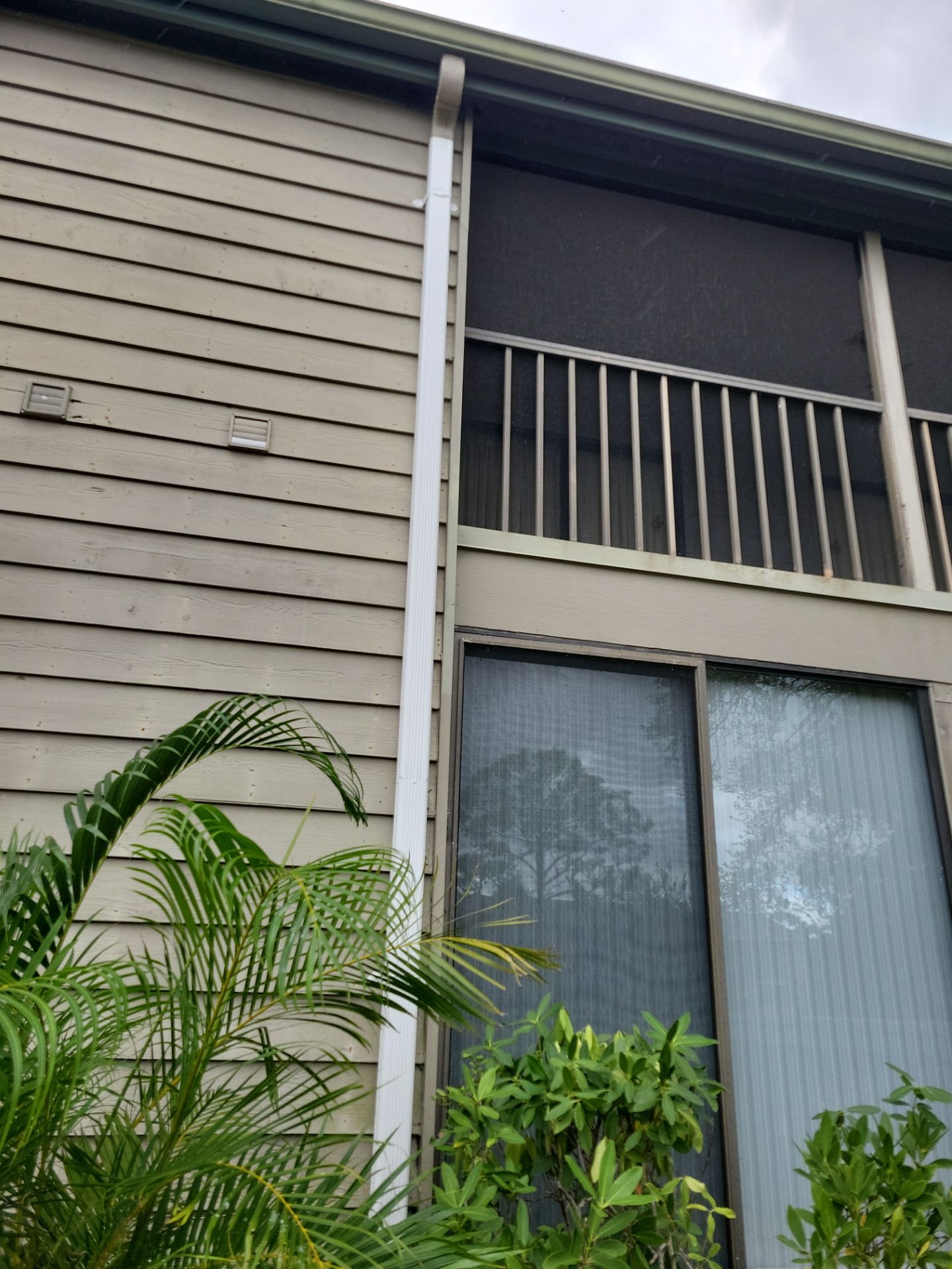 White Gutters Repair and Installation in Sarasota FL by Gutter Professors