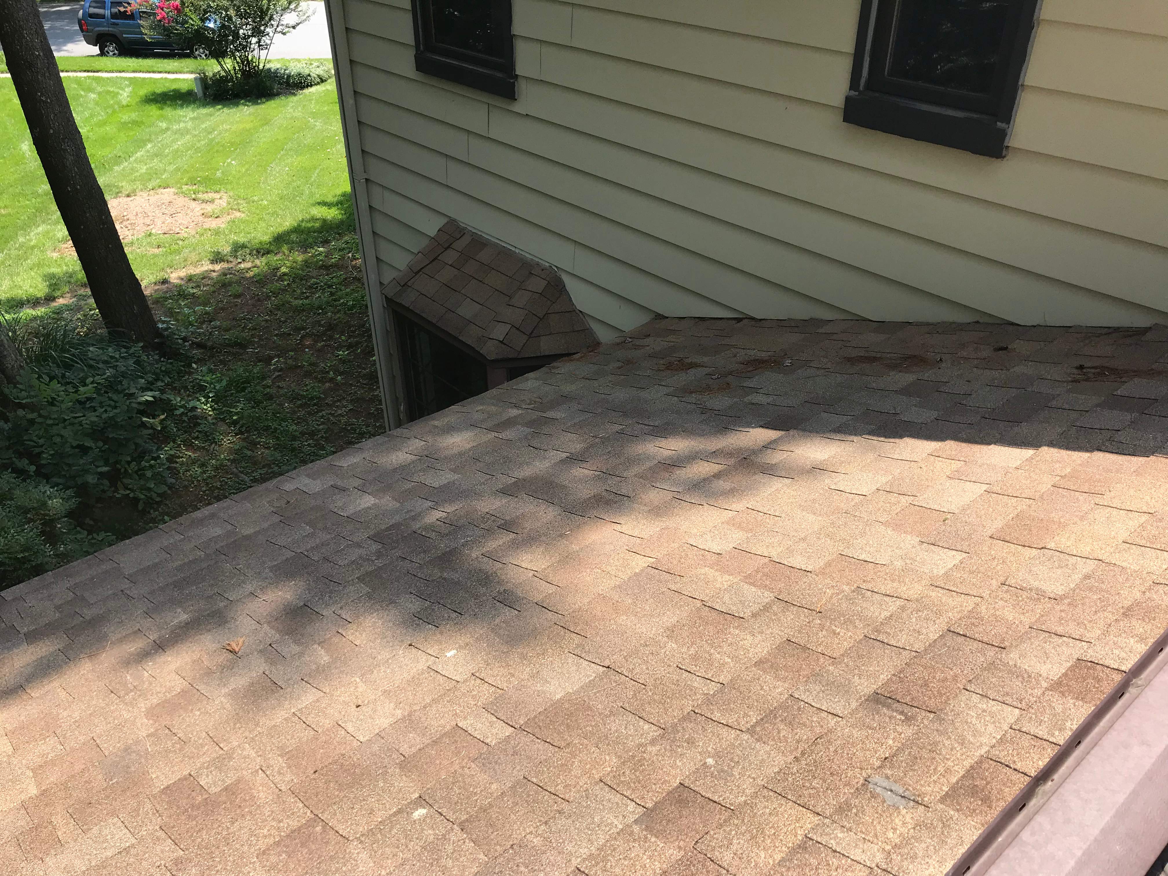 Residential Roofing Installation using Landmark Shingles Color Weatherwood by Alpha Design Services