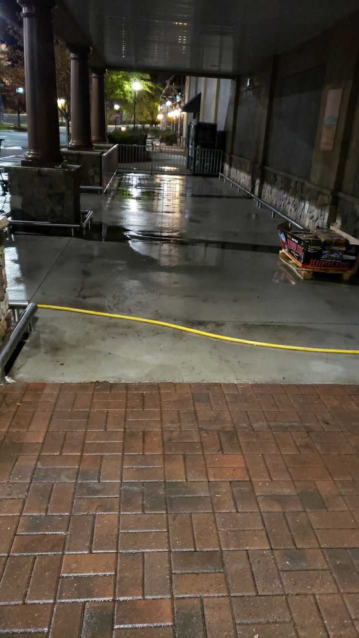 contrete cleaning using cleaner by Power Wash Masters LLC