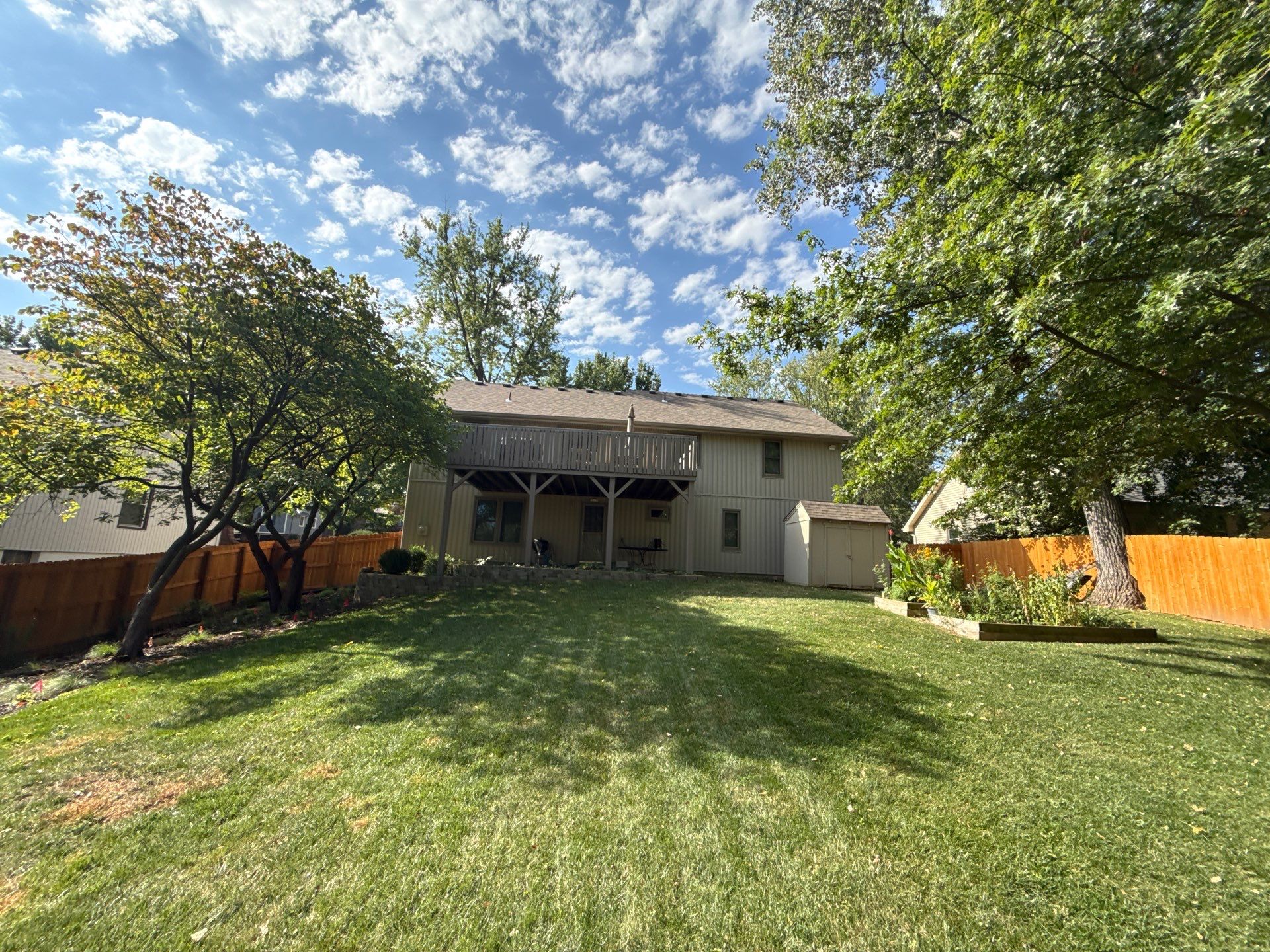 Comprehensive Kansas City Exterior Remodel Featuring Board And Batten Siding by EEC Windows, Siding & Roofing