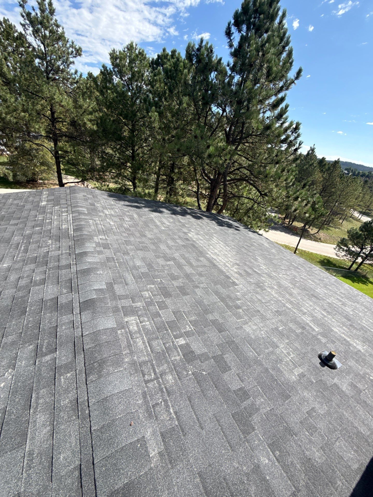 Full Architectural Shingle Installation for Contemporary Rapid City Residence by Weather-Tite Exteriors LLC