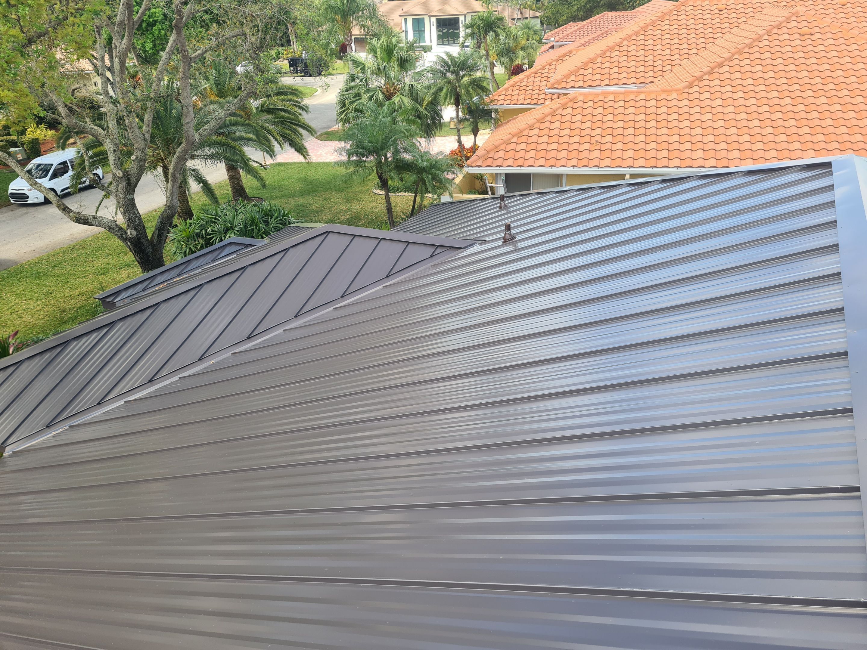 Residential Roofing Installation using 1" Nail strip metal roof by BLUES BROTHERS ROOFING