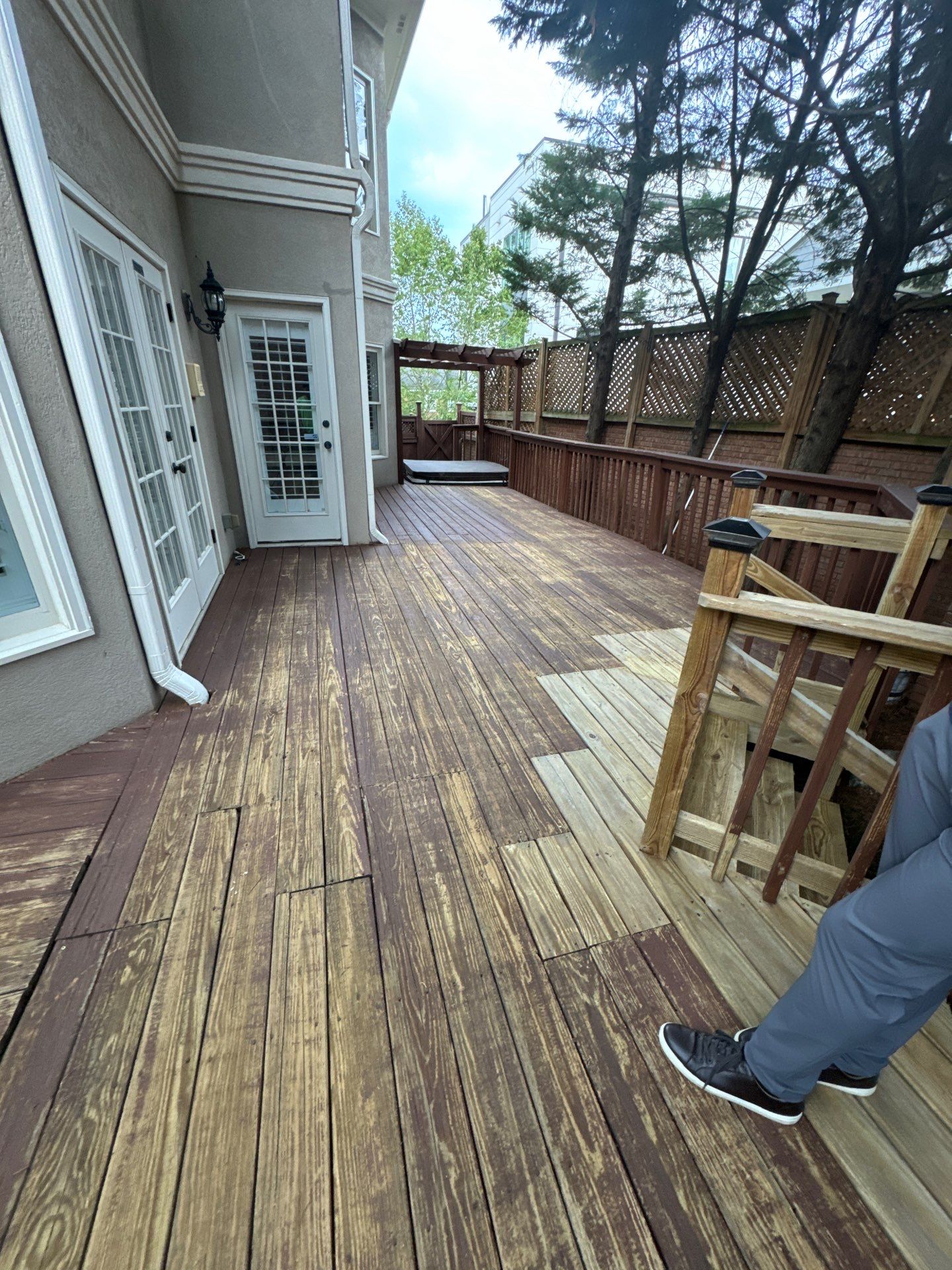 Full Exterior Stucco Painting and Wood Deck Staining in Atlanta by Swift Home Renovations