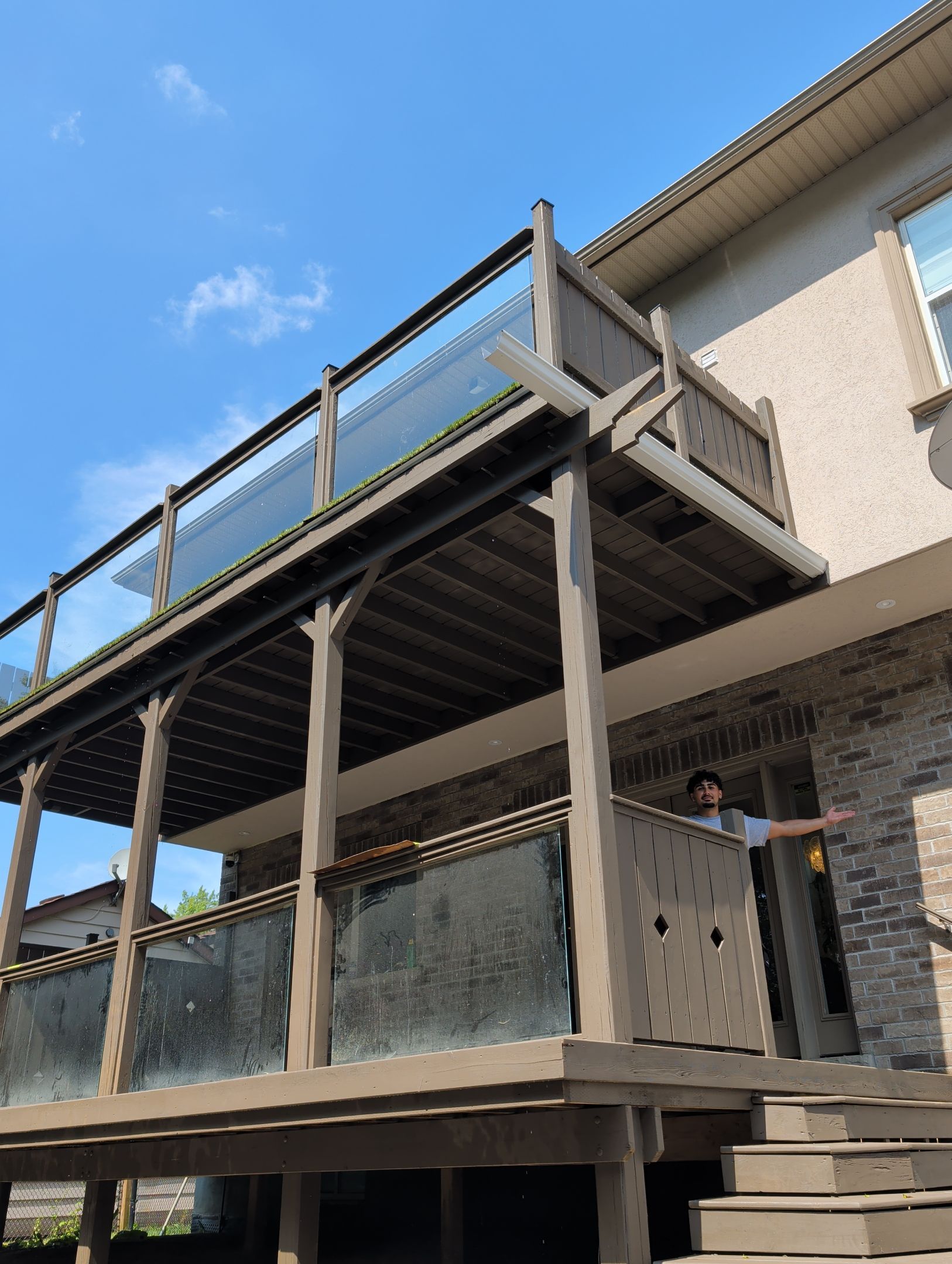 Multi-Level Deck Restoration and Glass Railing Installation in King by GTA HOME PAINTING
