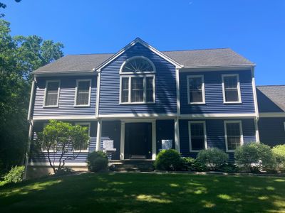 Siding facelift with Cert Monogram D/4 x16'8" clapboard, Midnight Blue & Cert Monogram D4x25' clapboard, Midnight Blue