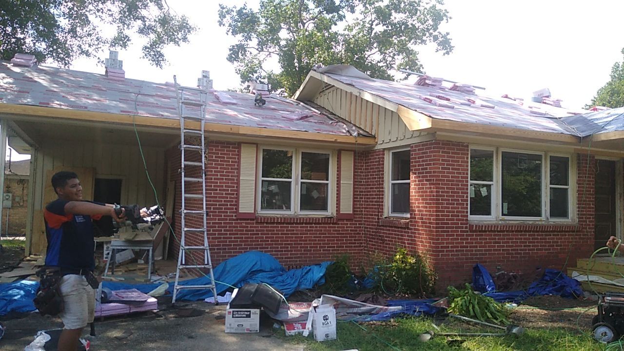 Residential Roofing Installation using Roof Replacement by American Roofing & Construction LLC