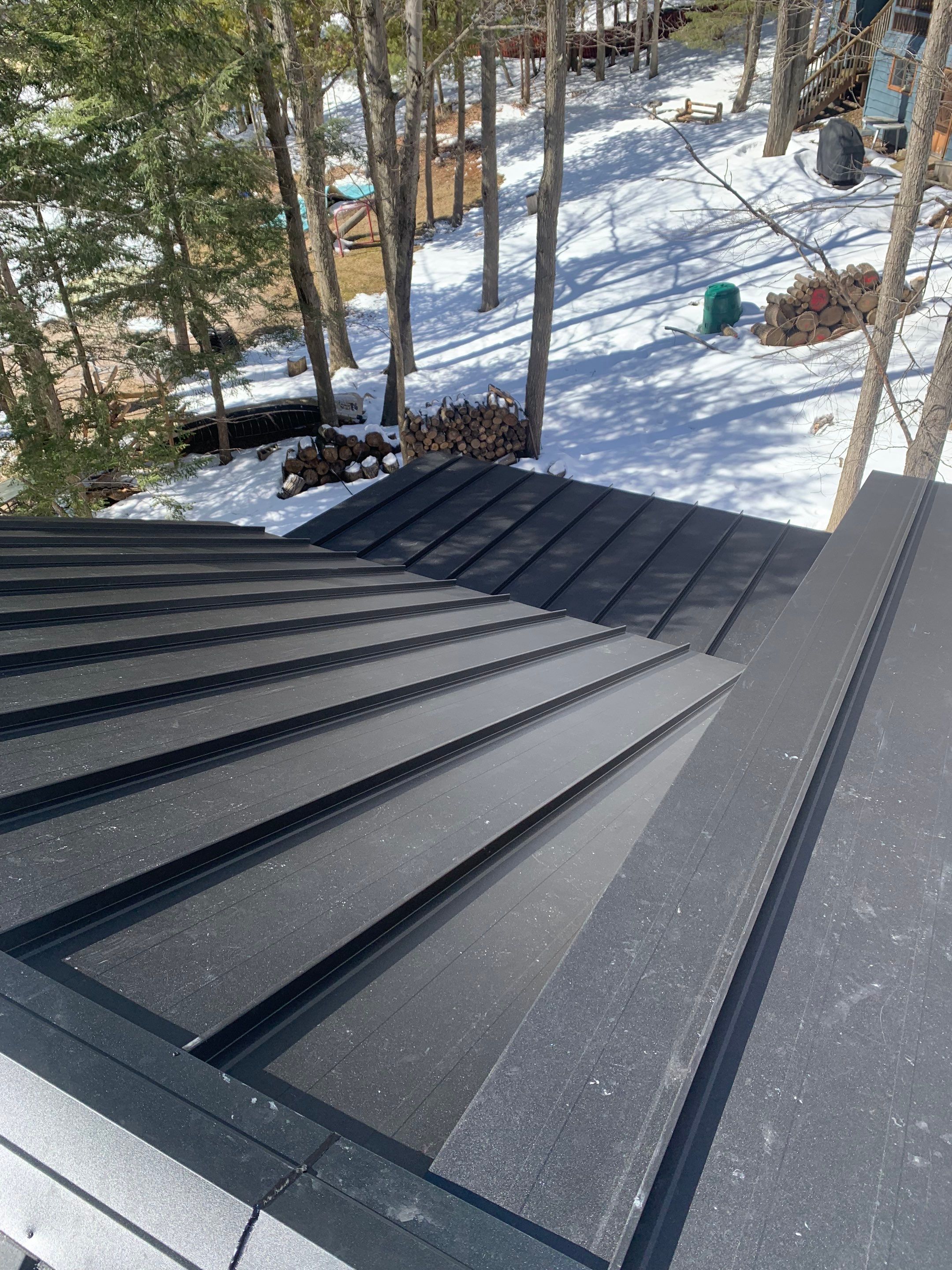 New Home Construction using 16" Standing Seam Panels by Jay Carter Roofing & Sheet Metal