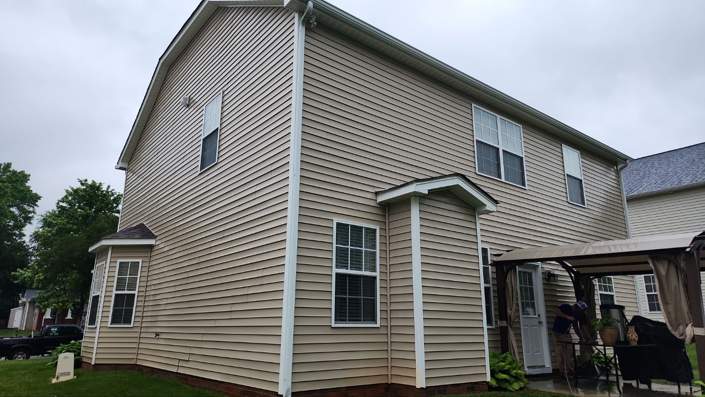 House Wash using cleaner by Power Wash Masters LLC