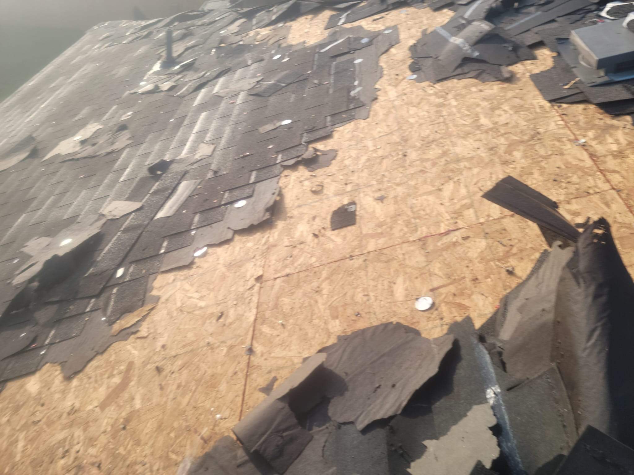 Residential Storm Damage Restoration and Roof Replacement in Manor by Caliber Restoration LLC