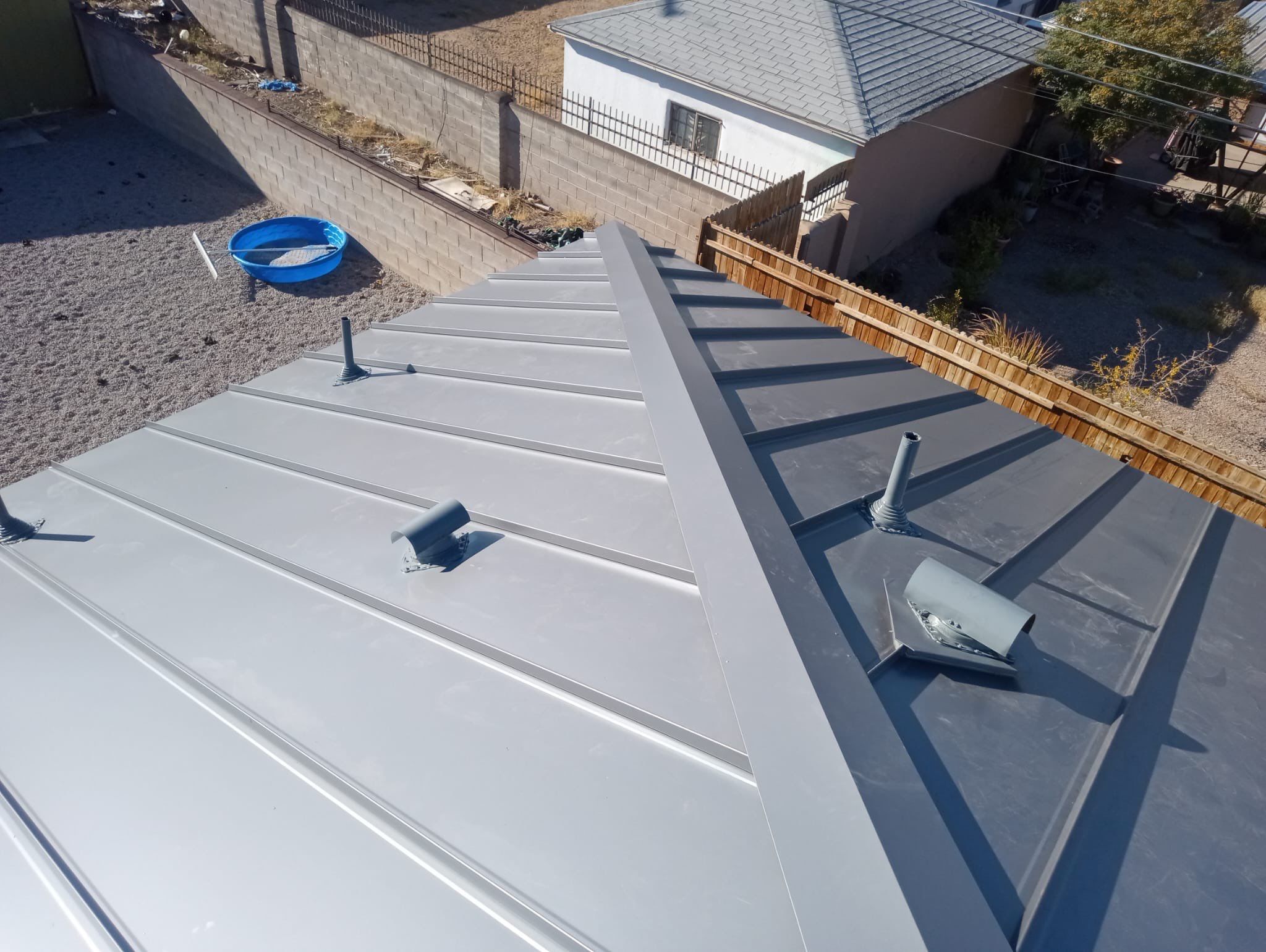 Charcoal Gray Standing Seam by Reimagine Roofing