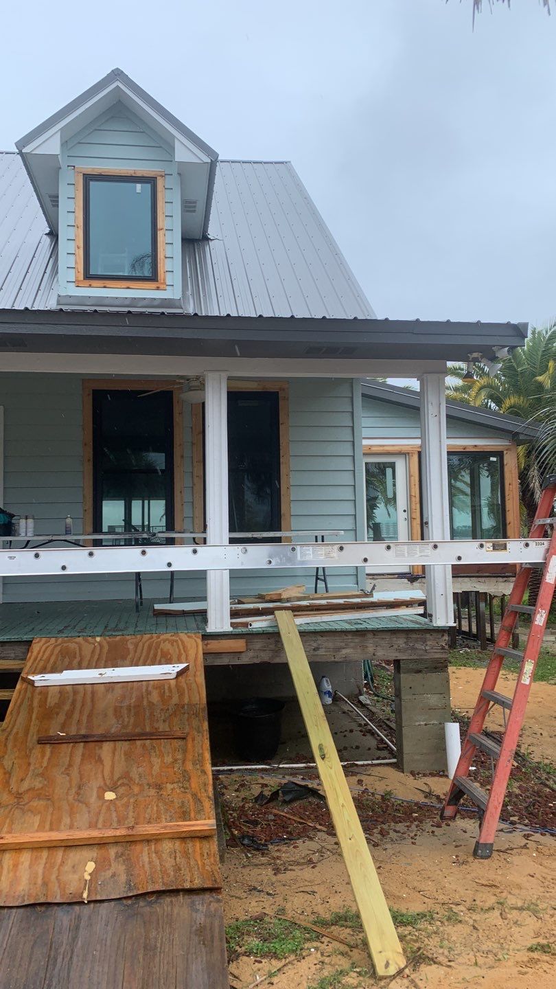 Seamless Gutter Installation using Charcoal Grey Gutters by Gutter Professors