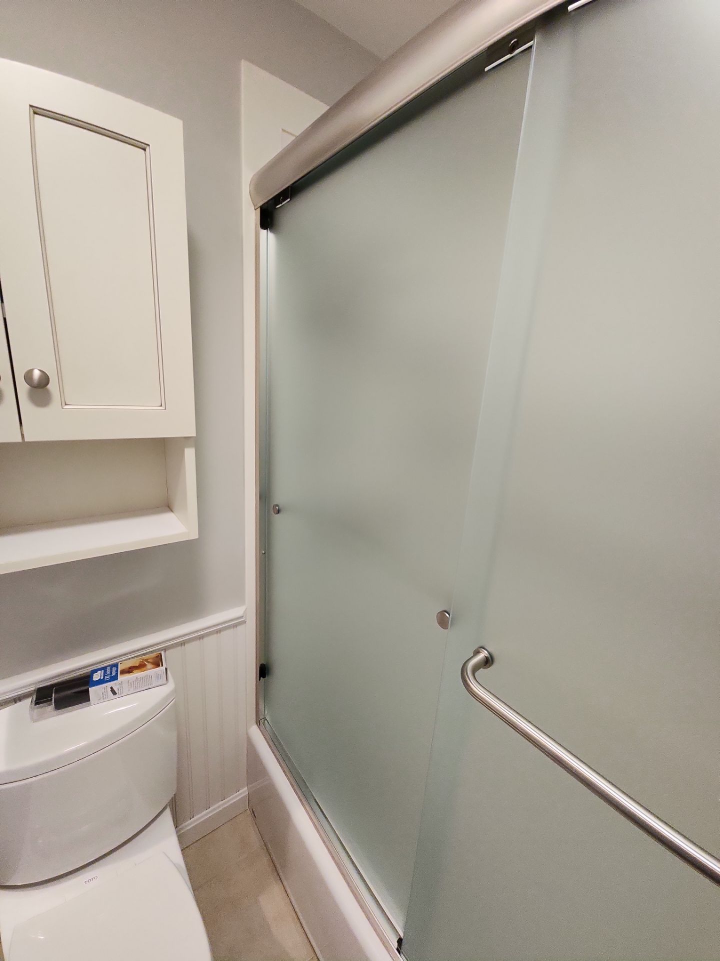 Semi-Frameless Sliding Shower Doors on Tub Base by Cheshire Glass Company