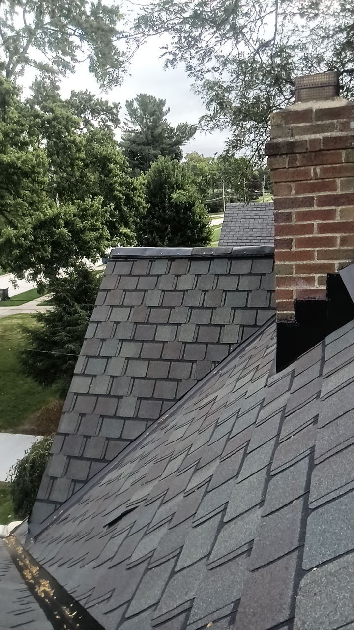 Residential Roofing Installation using Certainteed Belmont shingle by Absolute Roofing and Construction