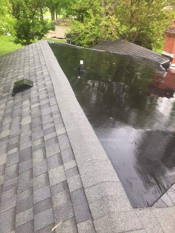 Residential Roofing Installation using 60 mil rubber roof  by Nitro Roofing and Construction