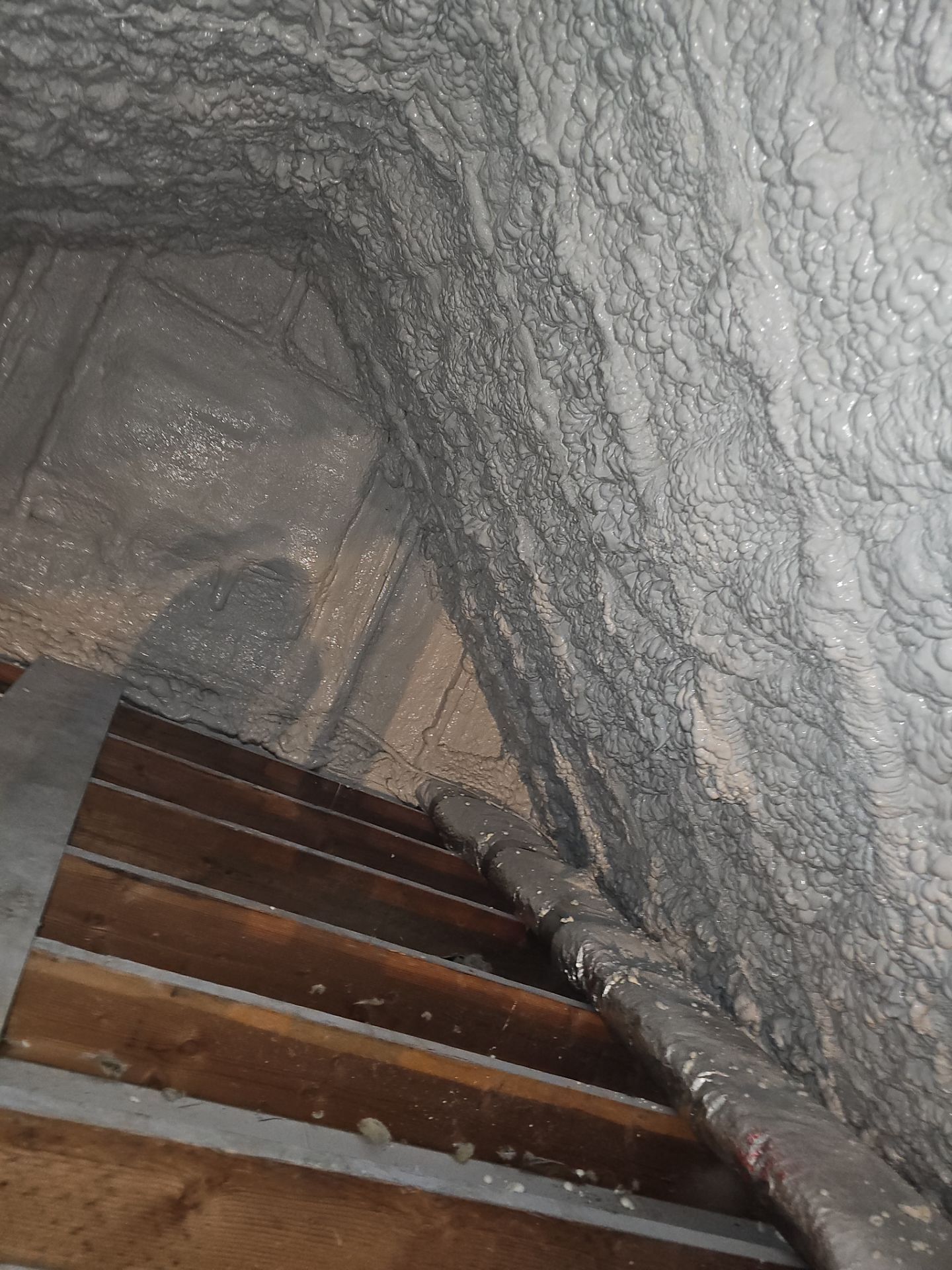 Attic Retrofit using open cell spray foam by NYS Foam & Energy