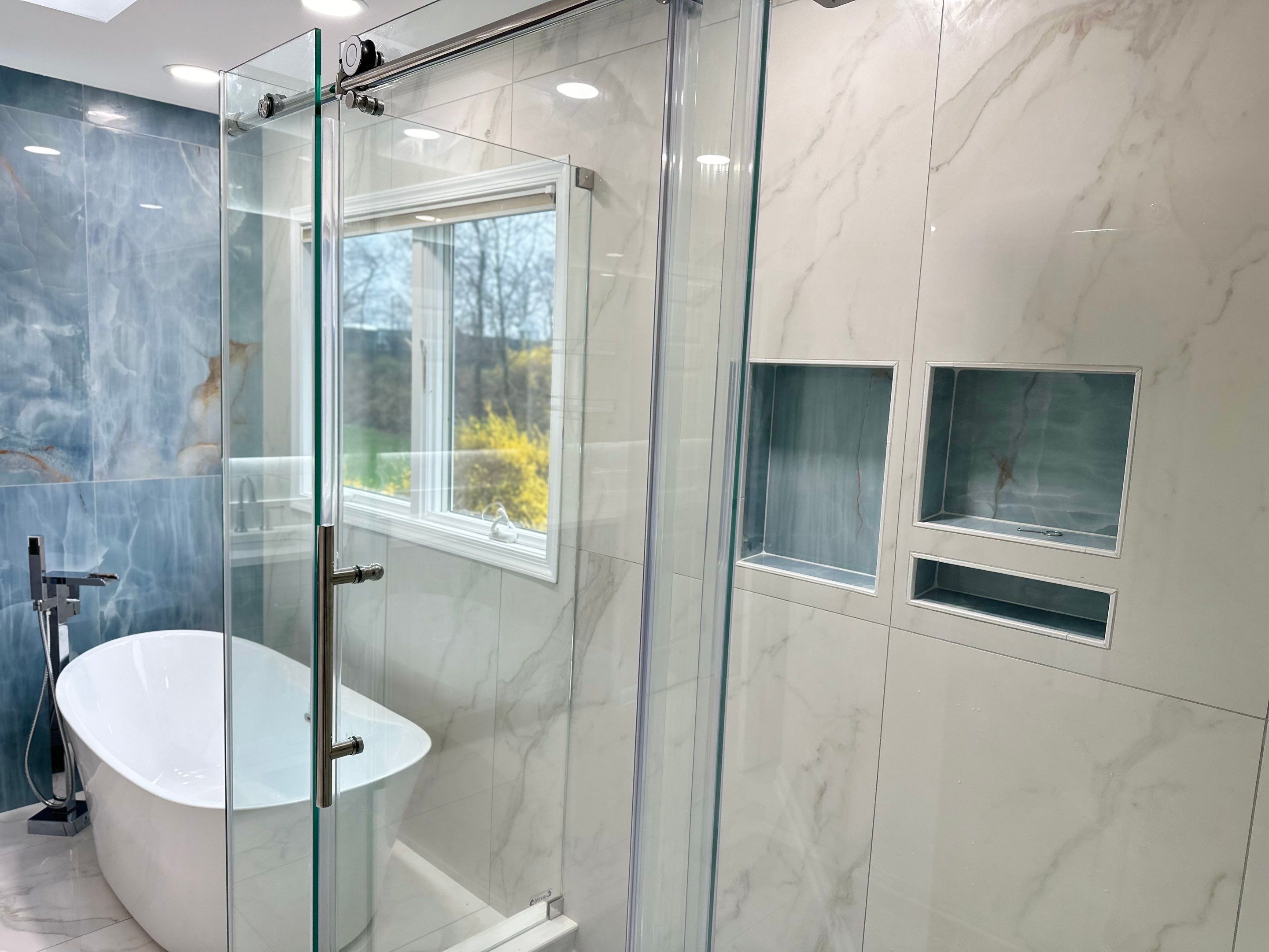 Bathroom Remodel using Tile by Home Concepts Construction