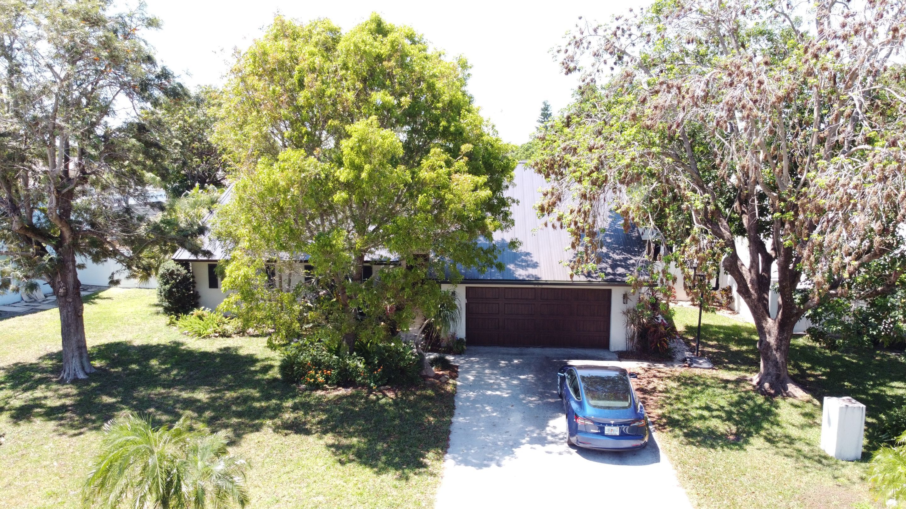 Residential Roofing Installation using 1" Nail strip metal roof by BLUES BROTHERS CONSTRUCTION CORP