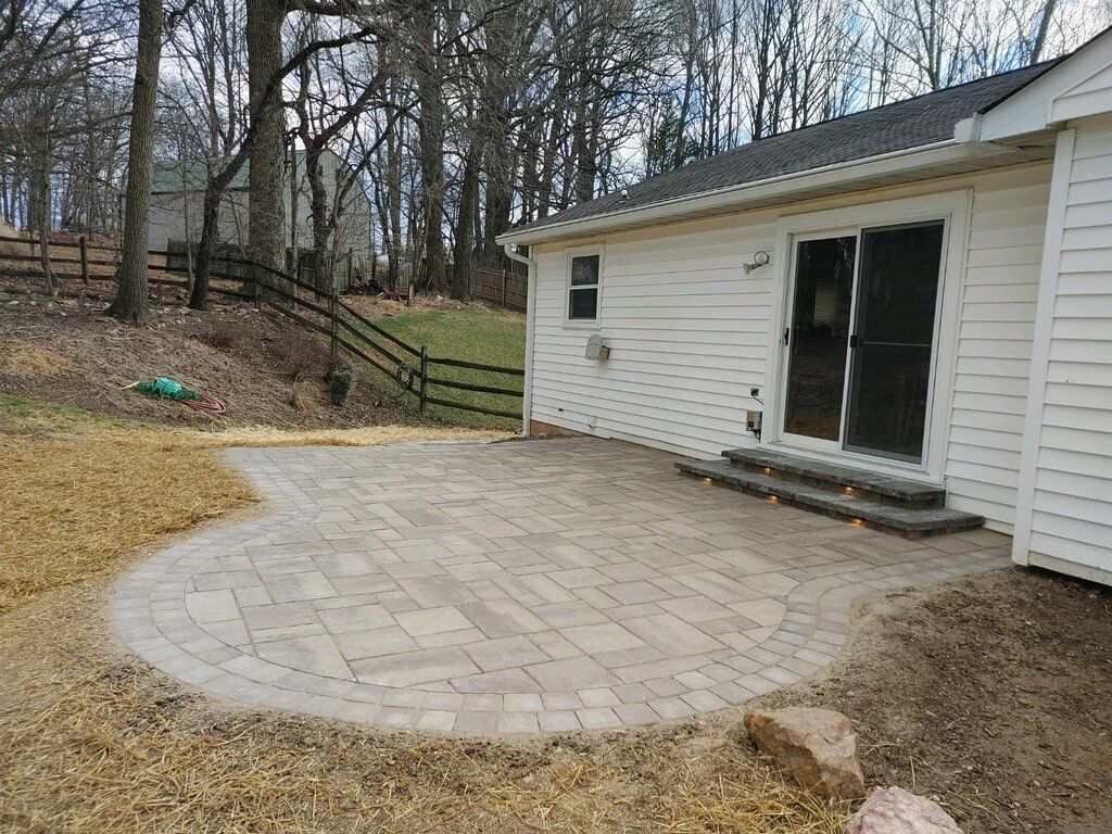 Backyard Transformation using Techo-Bloc Pavers by The Smet Companies, LLC