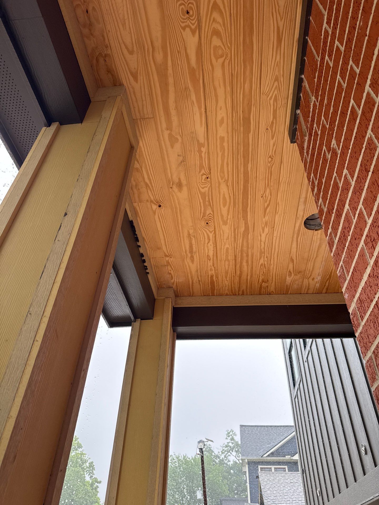 Midtown Elegance: Brickwork with Slurry Finish Refinement by Apex Conventional Stucco Llc