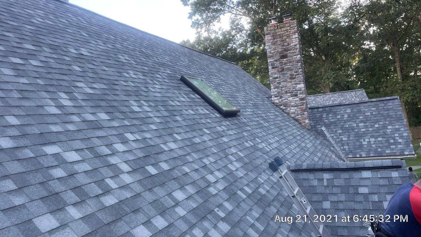 Roof Replacement using IKO Dynasty by American Home Contractors