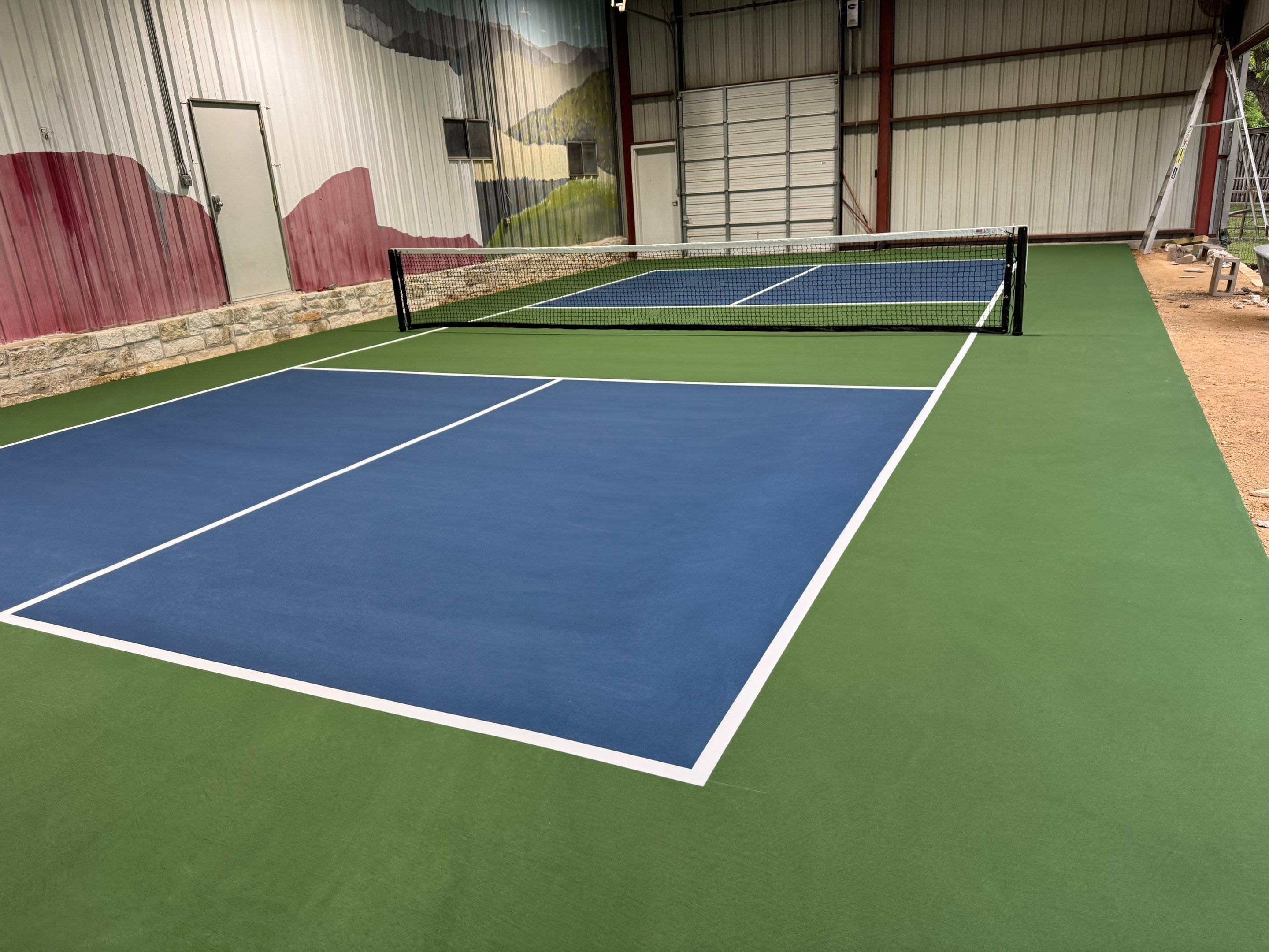 Pickleball Court in Barn on Lake Austin by Sport Court Austin
