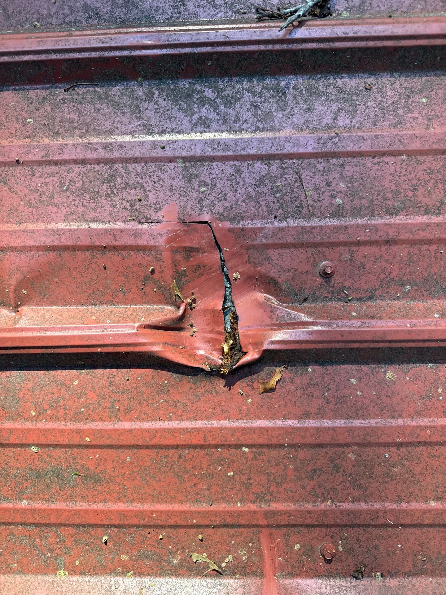 Red Metal Roof Restoration and Wood Fascia Replacement in Barboursville by Cade Construction