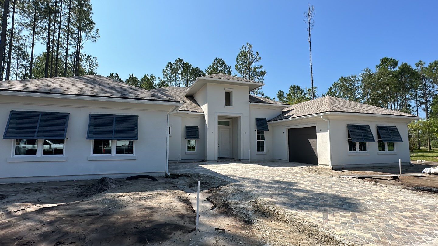 Bahama Shutters in Blue Grey  by Smart Guard Shutters