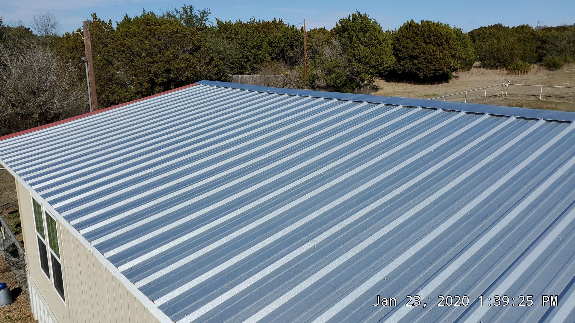Residential Roofing Installation using PBR Metal Roof by Harvey Roofing & Construction