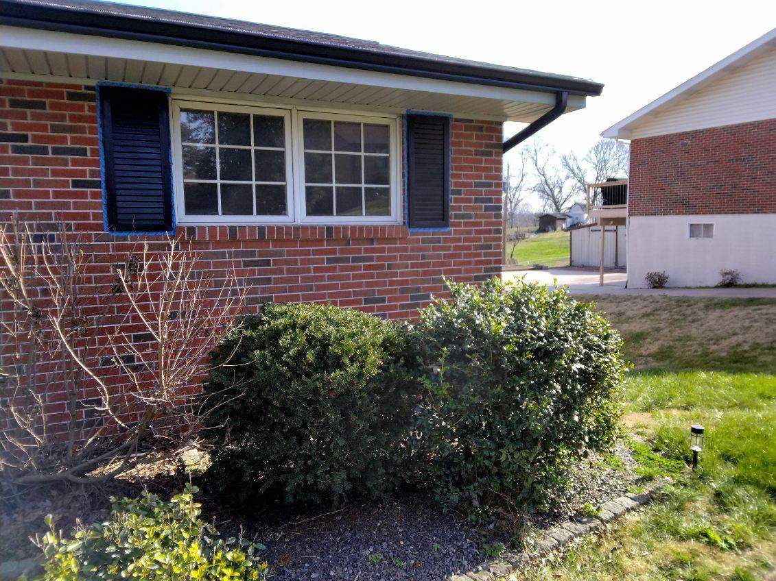 Exterior Metal Shutter Repainting - Fenton, MO by Legendary Services Company LLC.