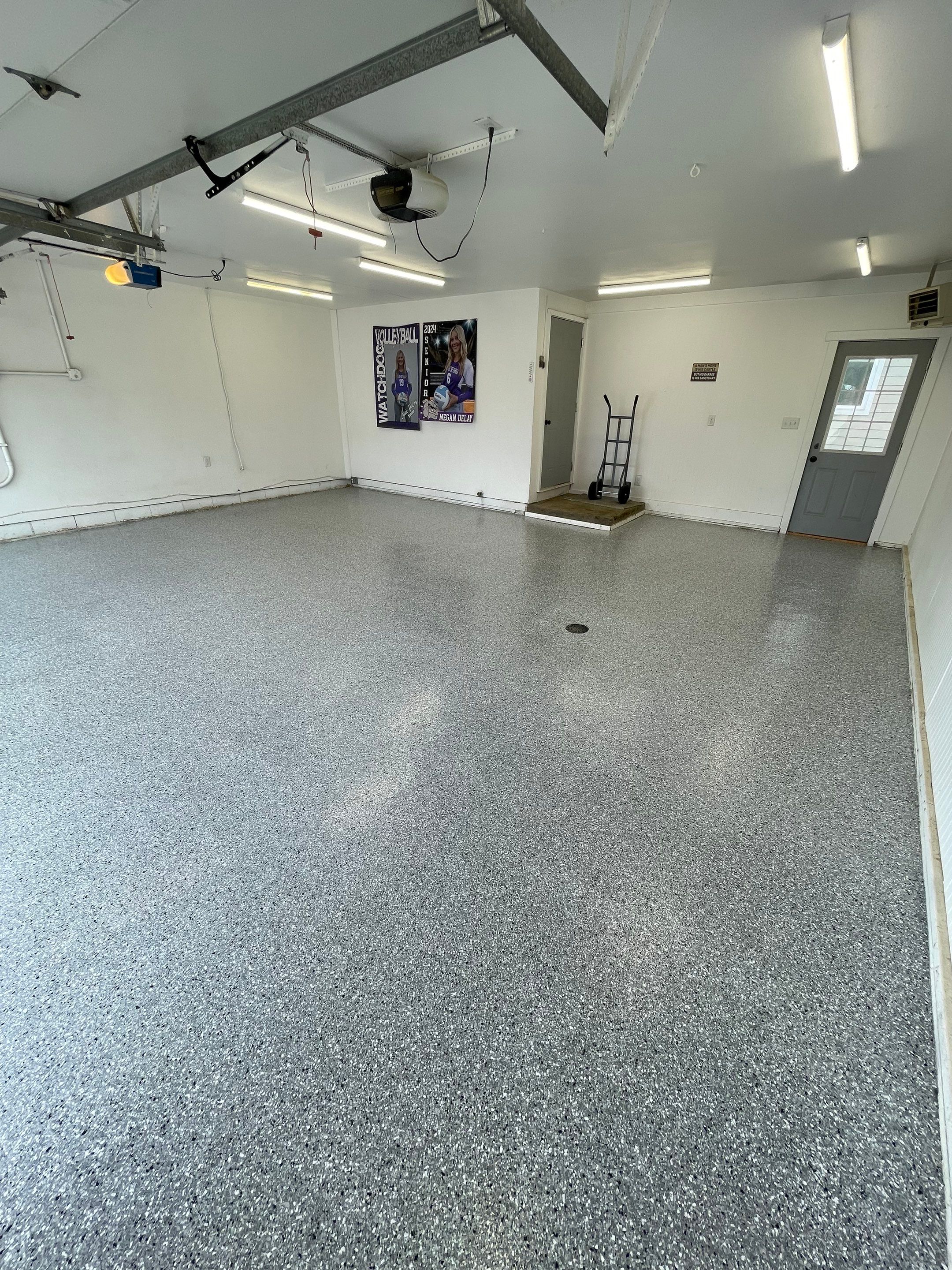 Feather Grey Garage Floor Coating and Crack Repair in Beresford by Select Painting, Coatings & Garage Cabinets