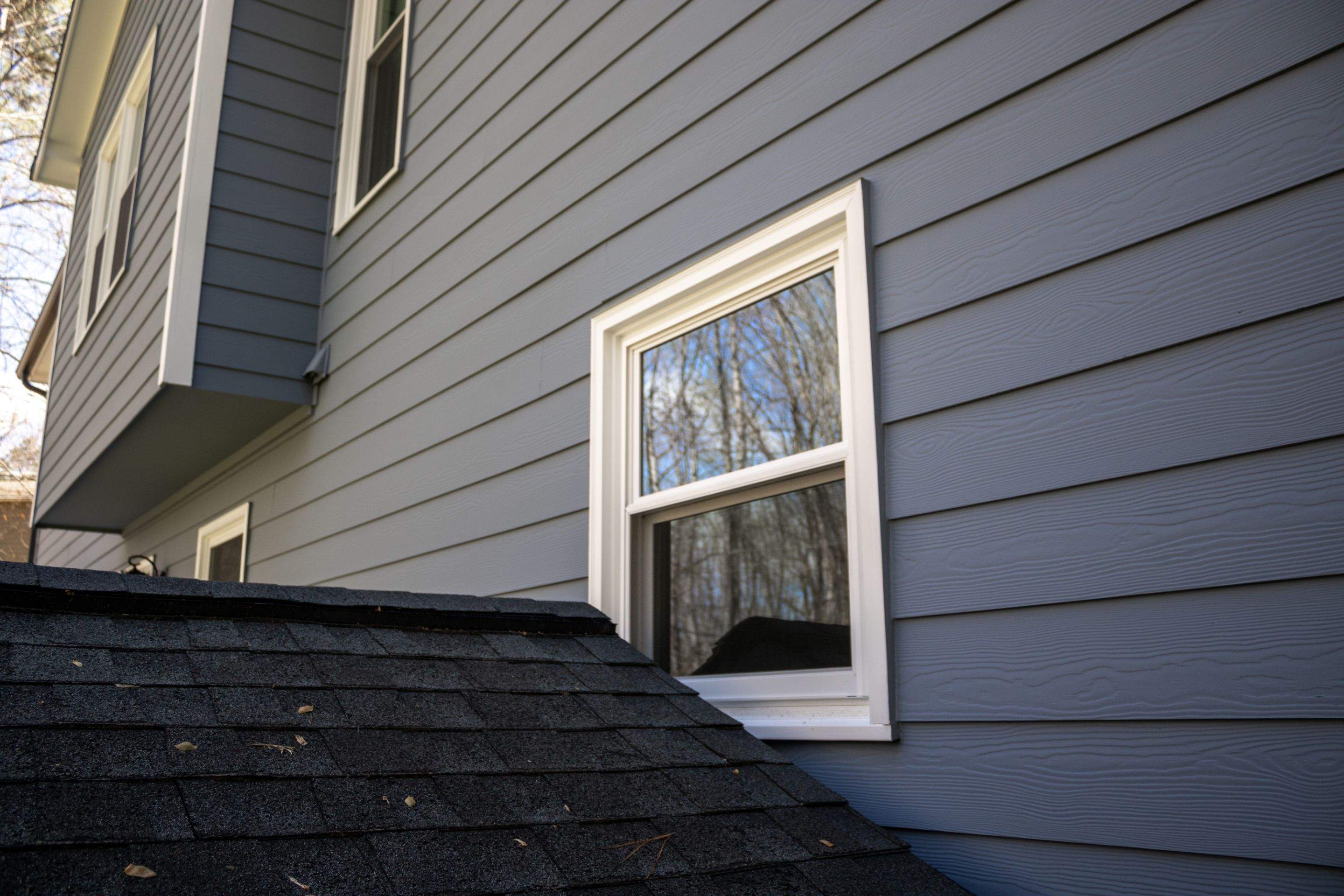 Marietta, GA Full Siding Replacement, 30+ Window Replacements, Screened-In Porch to Sunroom Conversion, Gutter Replacement, and Exterior Painting by Nelson Exteriors