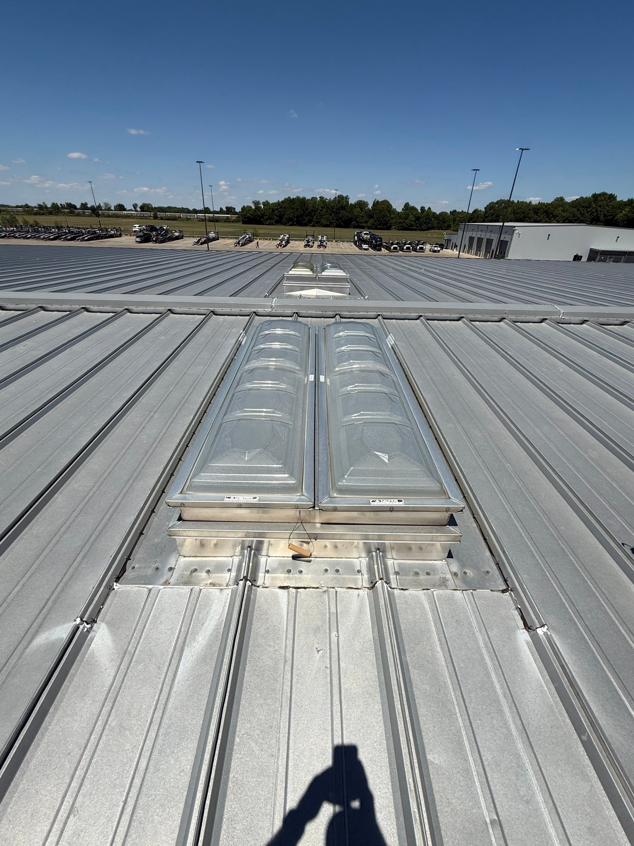 Commercial Metal Roof Repair and Skylight Sealing in West Memphis by Revival Roofing Services