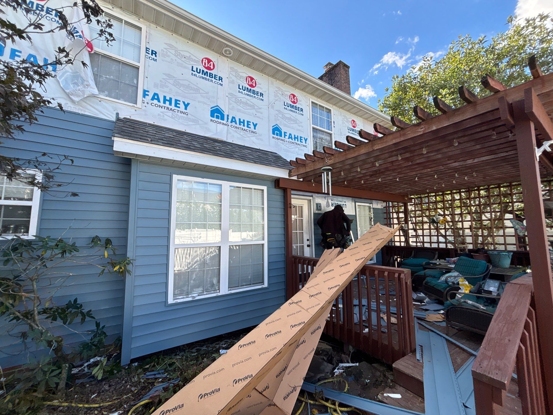 Landmark Pro, Siding, and 6" Gutters by Fahey Roofing + Contracting