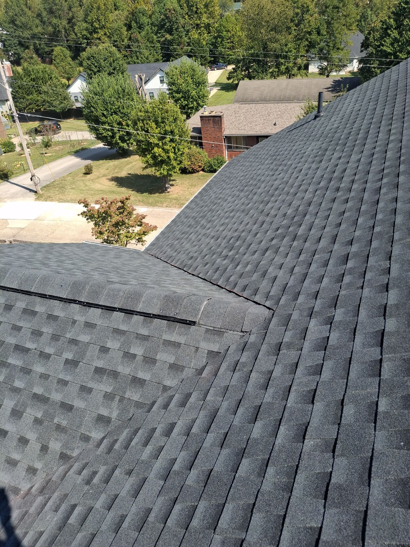 Residential Roofing Installation using GAF Timberline HDZ Charcoal by Rainstoppers Roofing