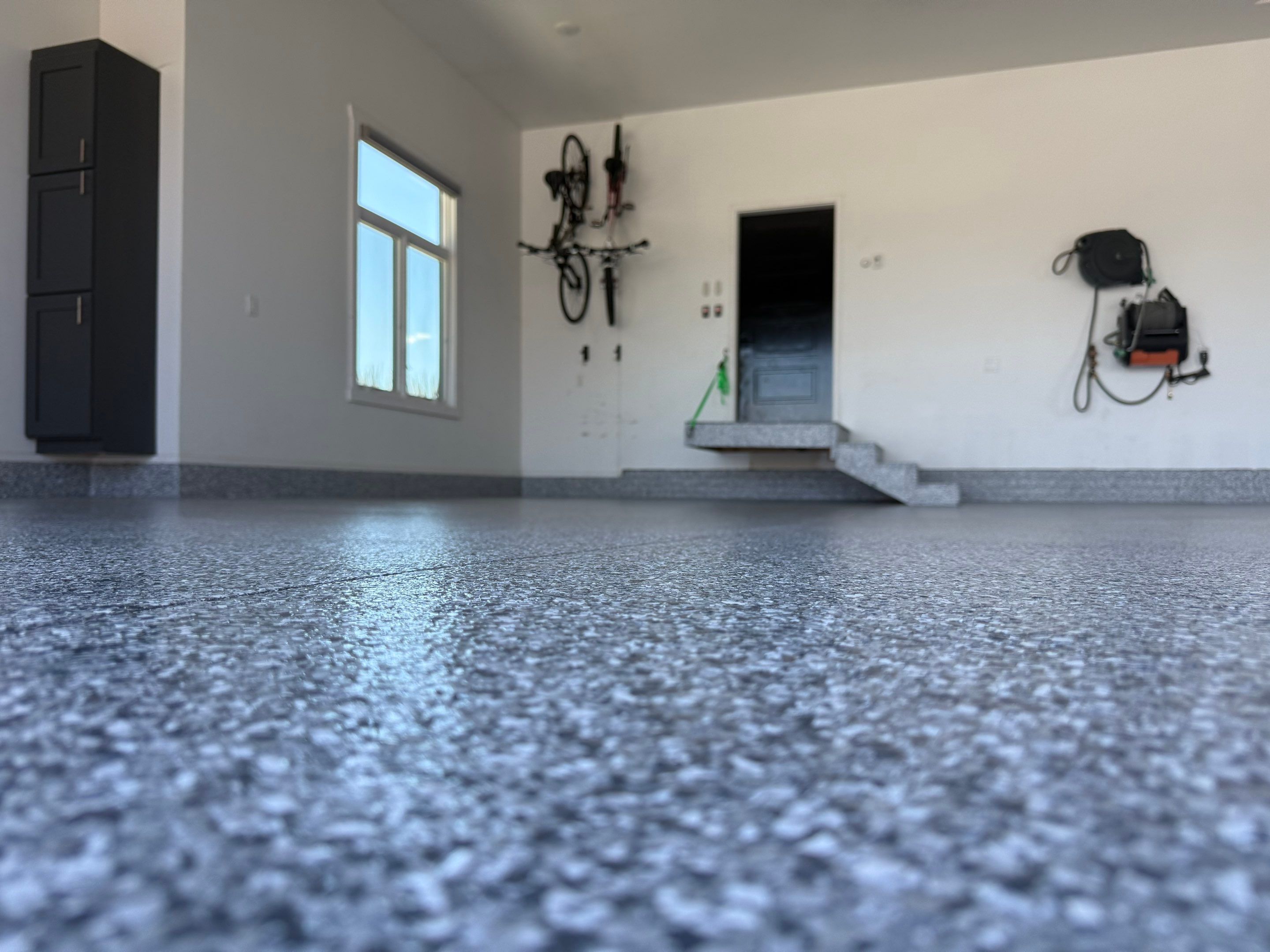 Gravel Flake Garage Floor Coating in Yankton by Select Painting, Coatings & Garage Cabinets