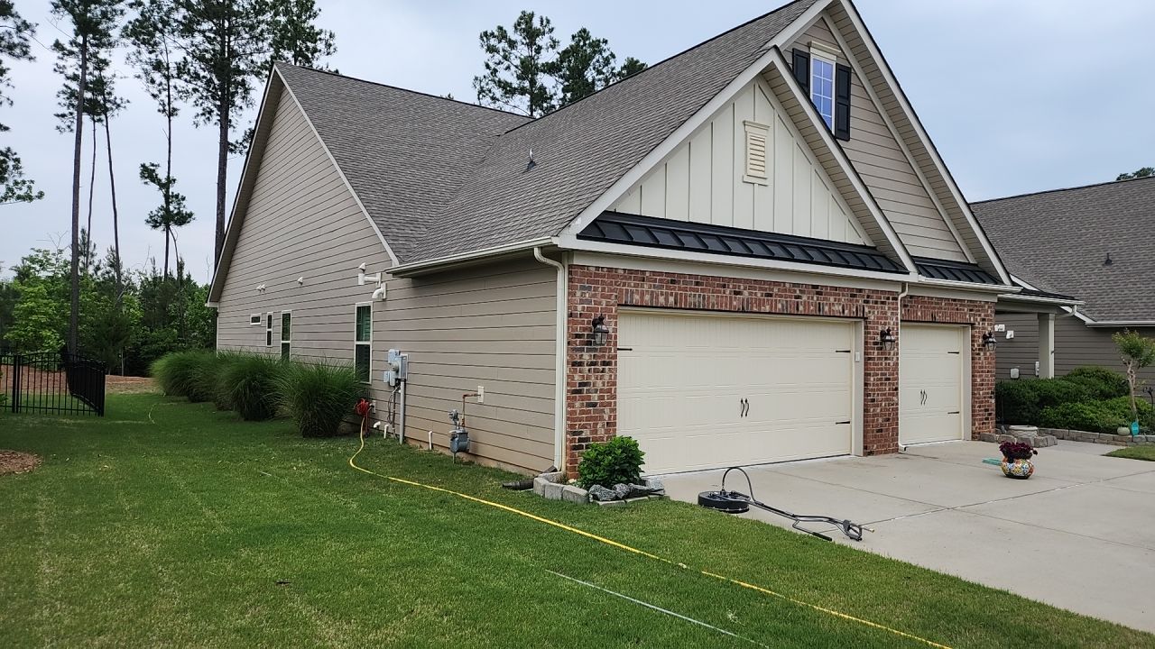 House Wash using cleaner by Power Wash Masters LLC