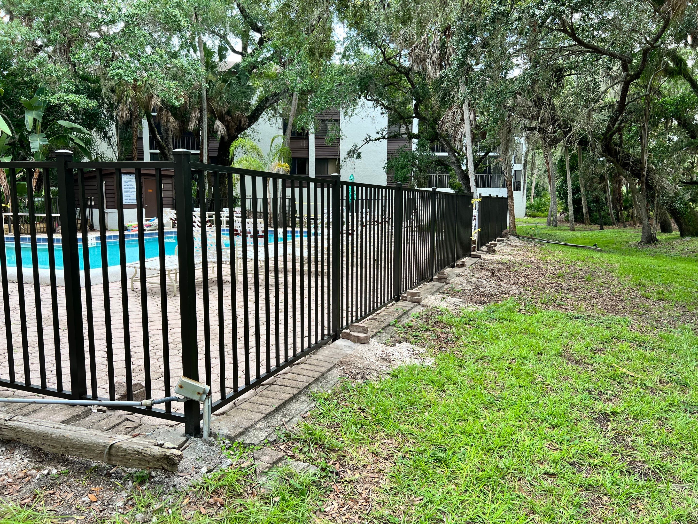 Sarasota, FL Commercial Aluminum Pool Fence & Shadowbox Wood Fence  by Asap fence and gates, LLC