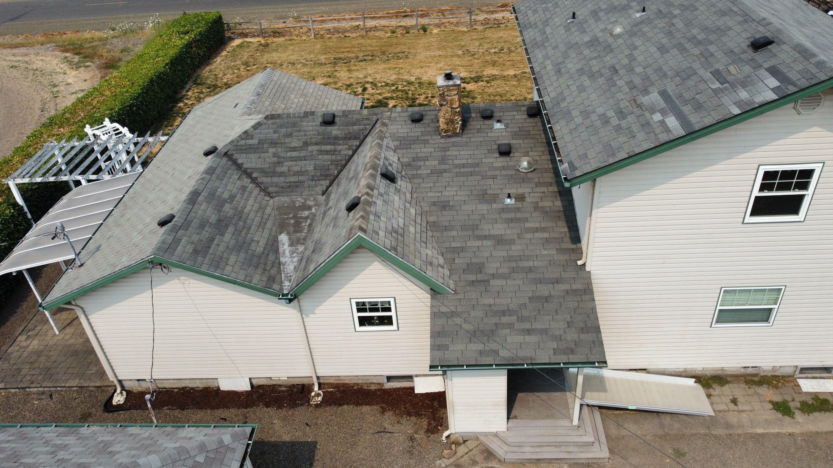 Residential Roofing Installation using IKO Dynasty (Color: Granite Black) by Orezona Building & Roofing Company, Inc.