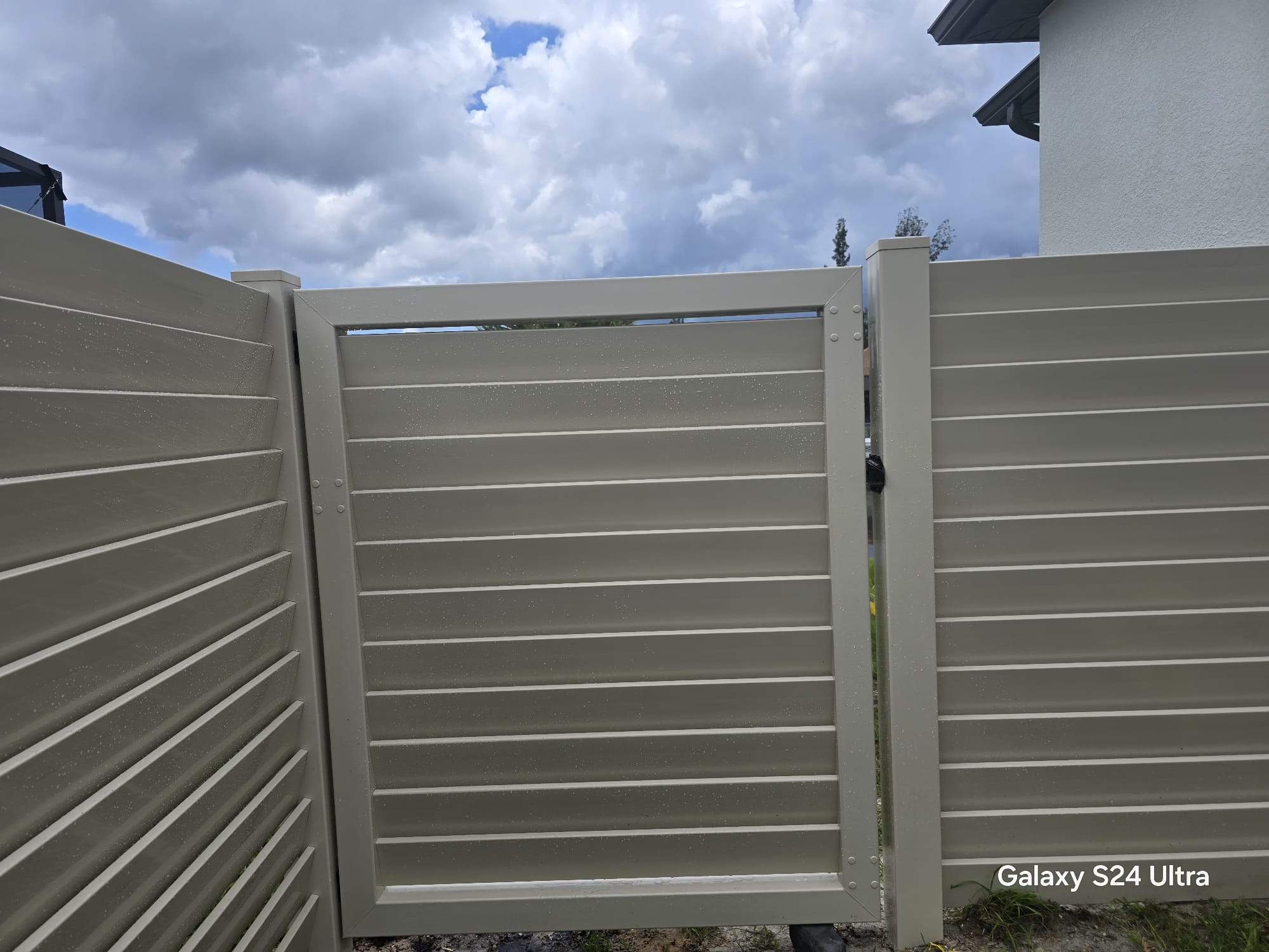 Tan Louvered Vinyl in Port Charlotte by True Fence LLC