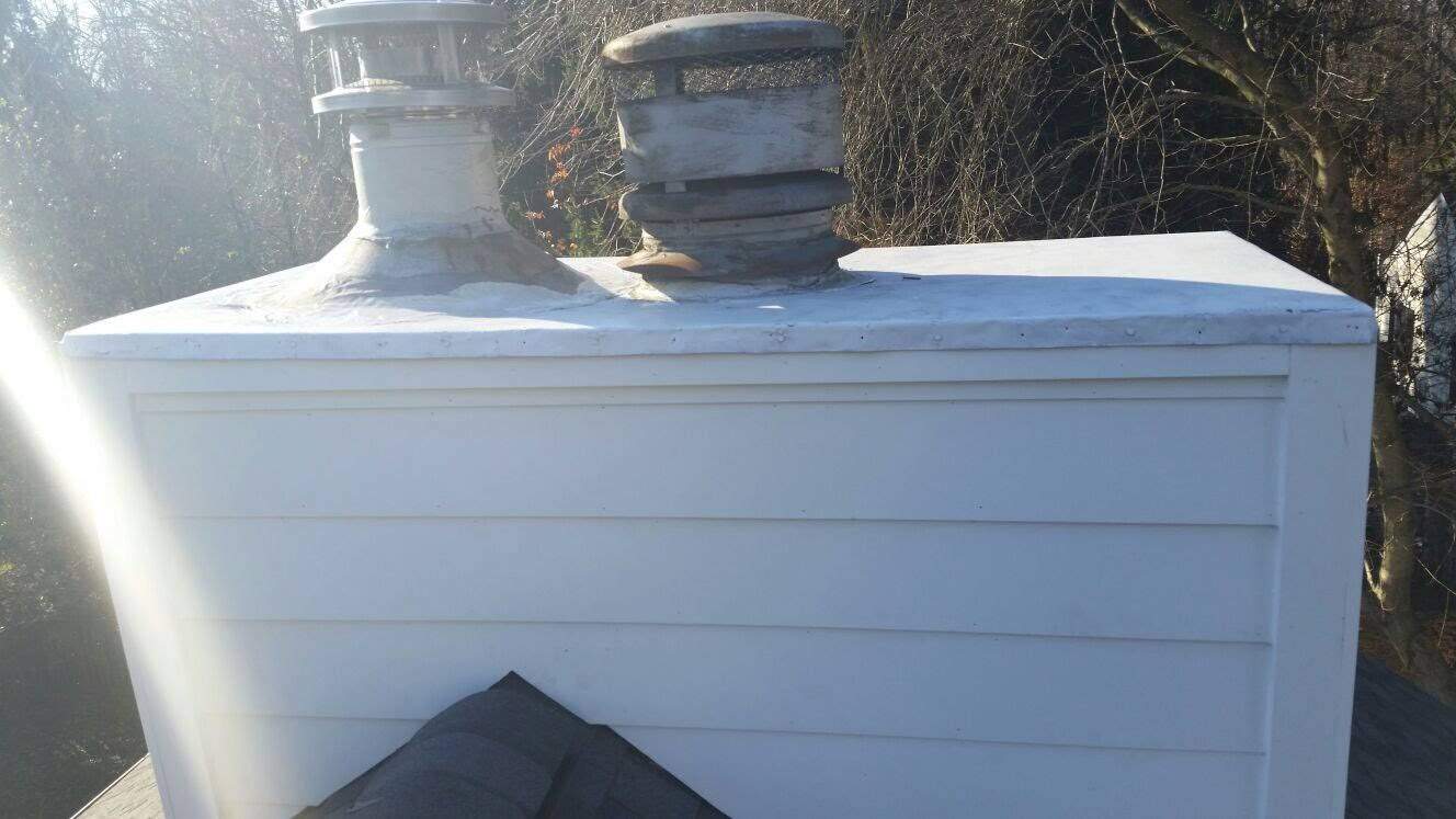 Residential Roofing Installation using Pewterwood Shingles  by Alpha Design Services